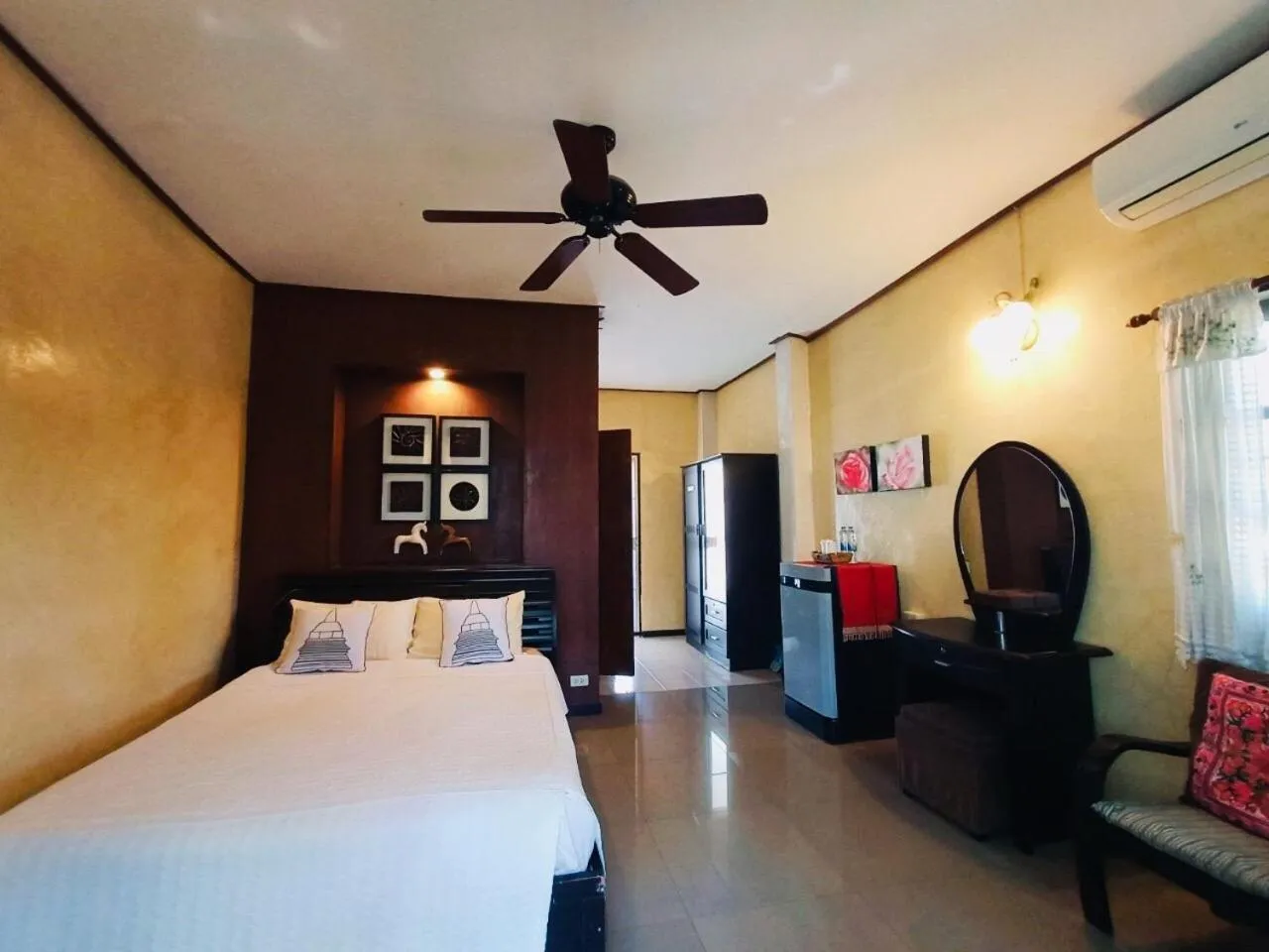 Bed in Baantawan Guesthouse Pai