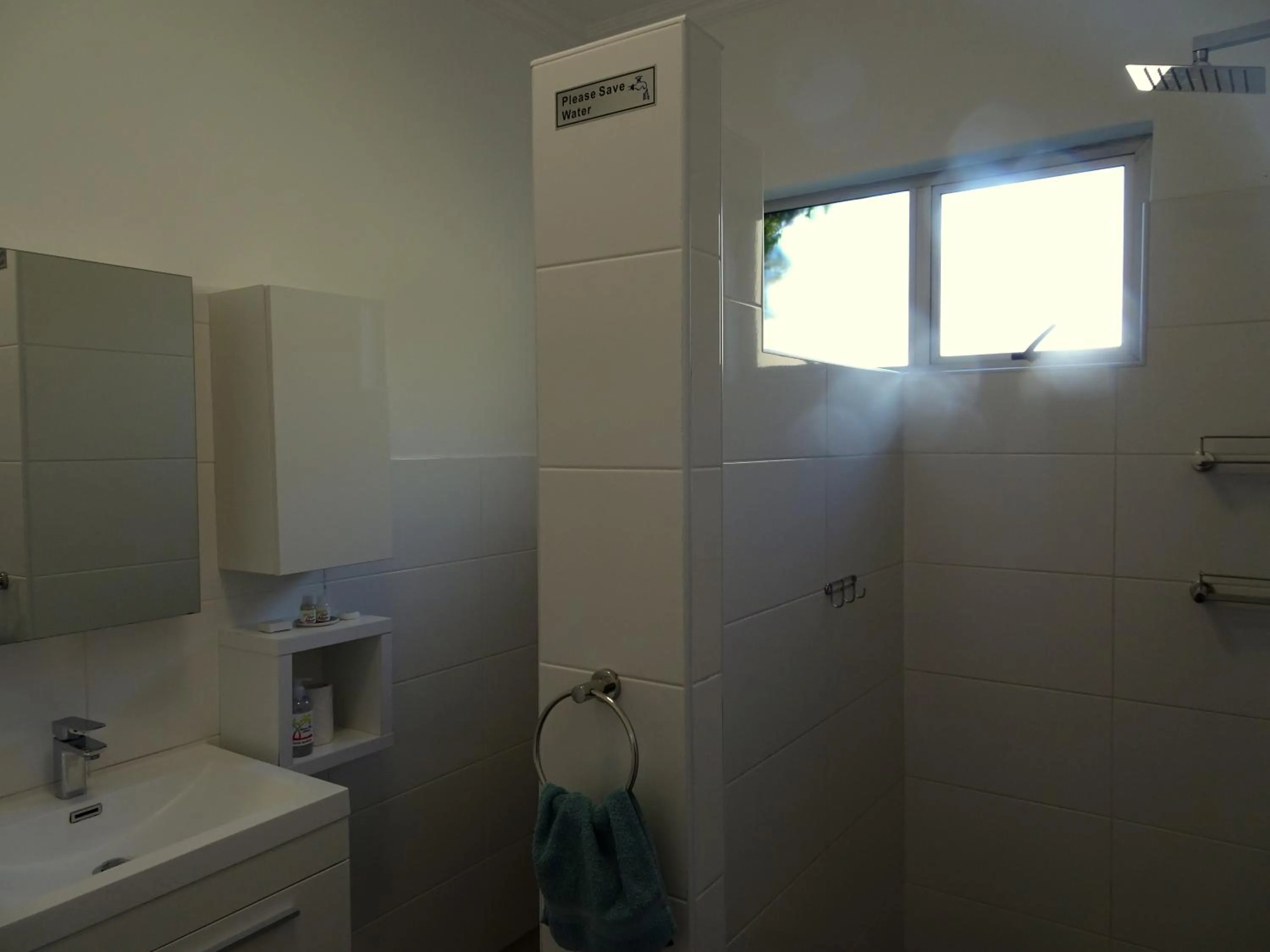 Bathroom in African Palm Cottage and Guesthouse