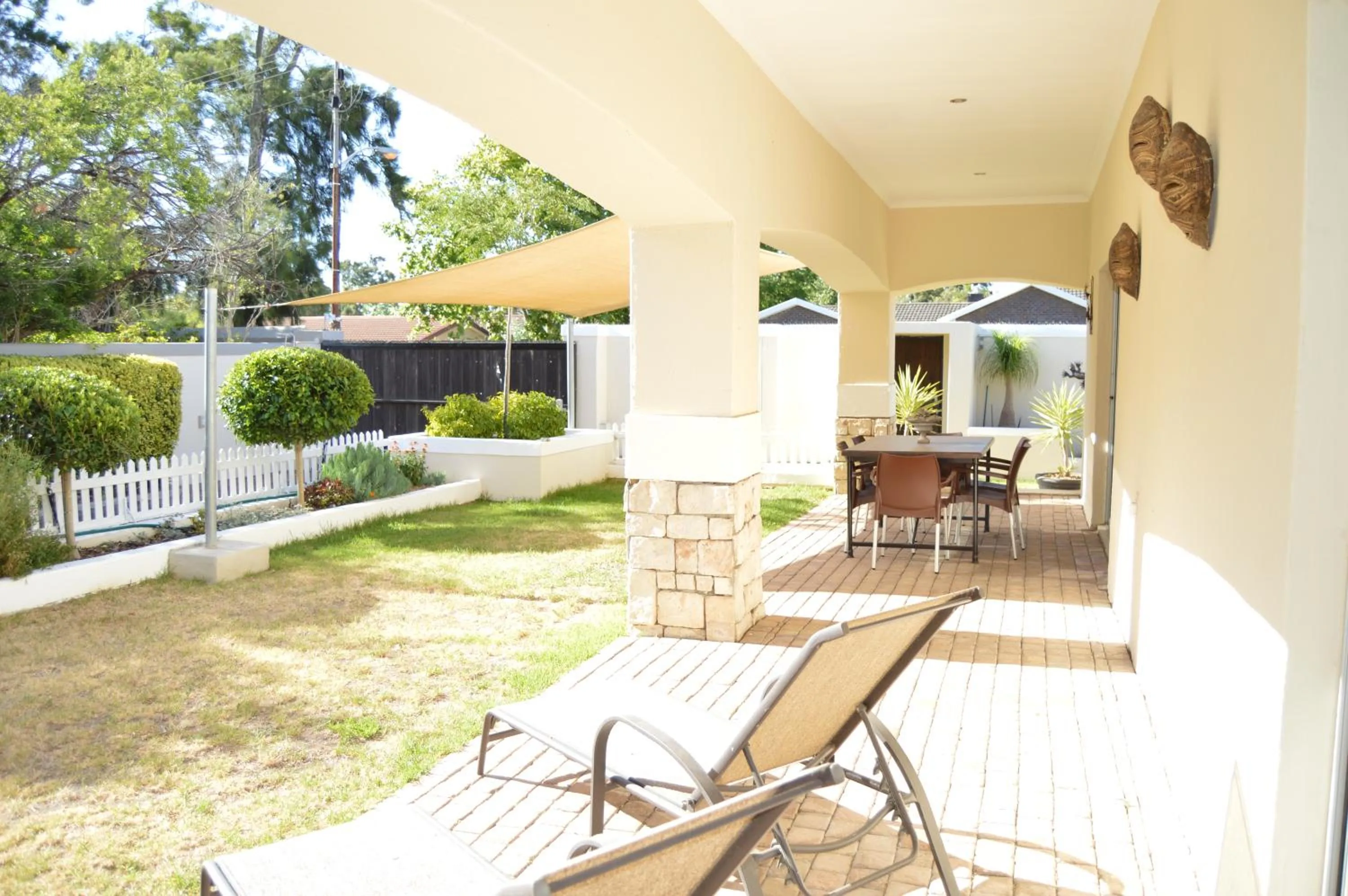 Balcony/Terrace in African Palm Cottage and Guesthouse