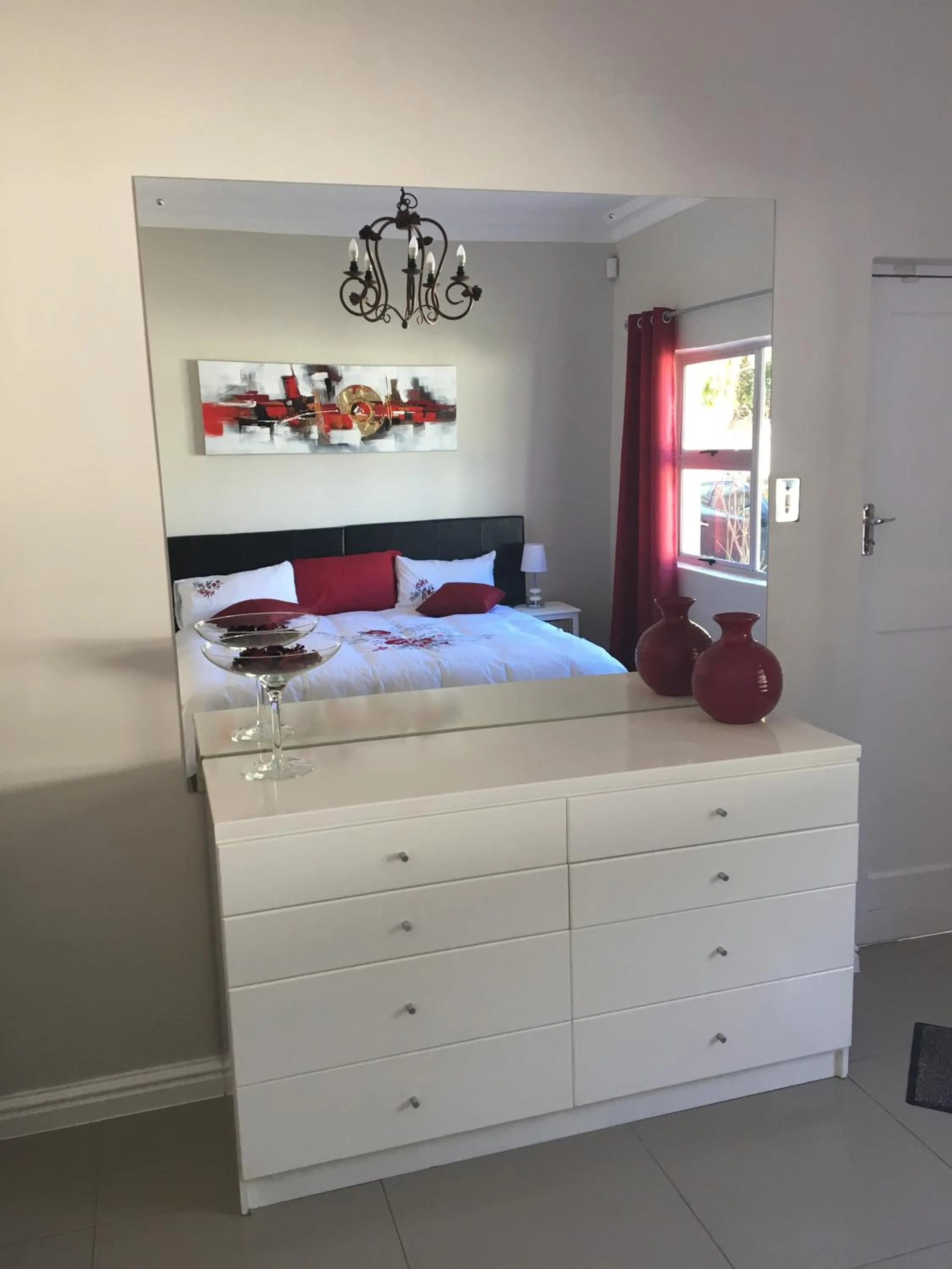 Bedroom in African Palm Cottage and Guesthouse