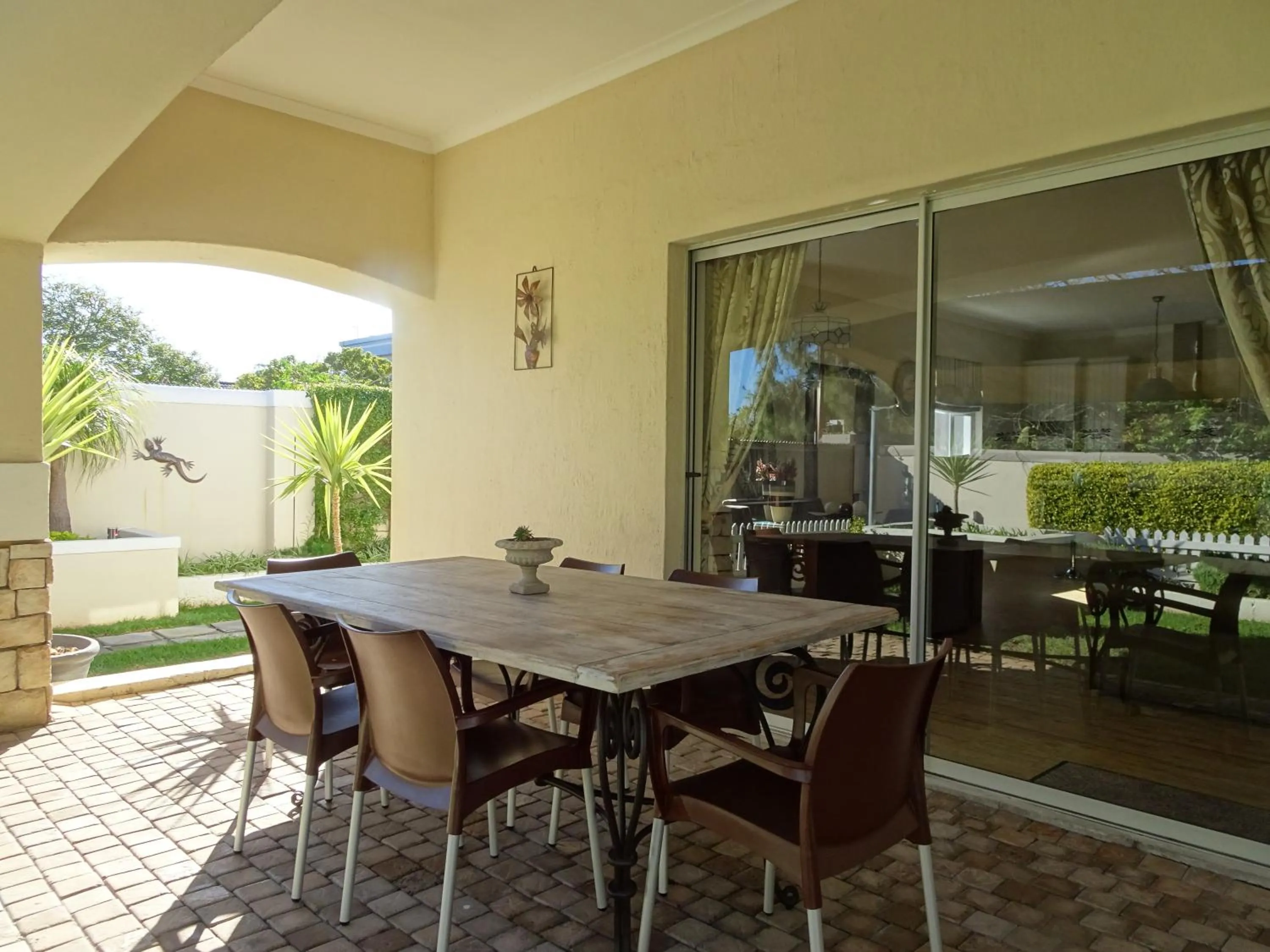 Patio in African Palm Cottage and Guesthouse