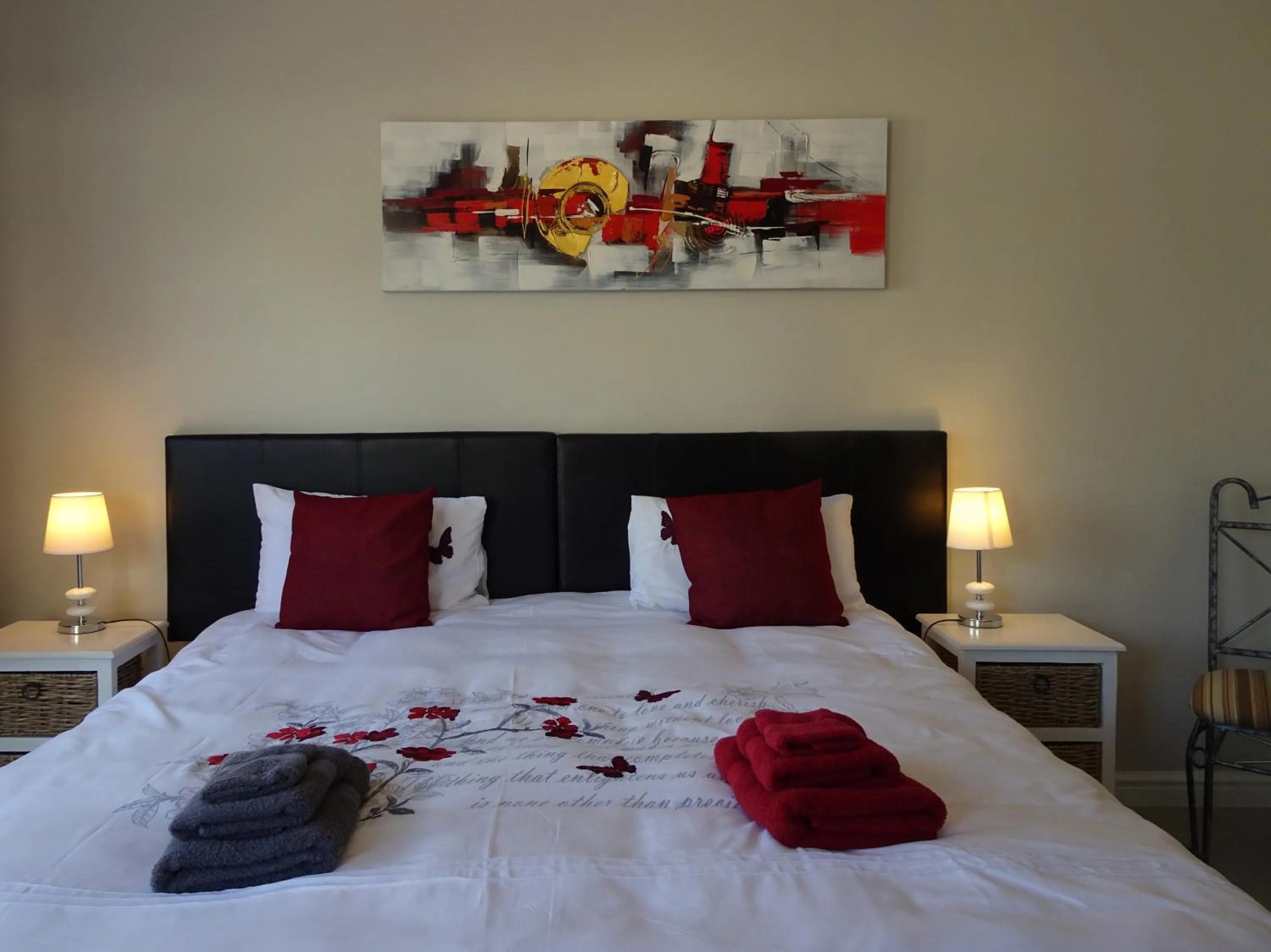 Bedroom in African Palm Cottage and Guesthouse