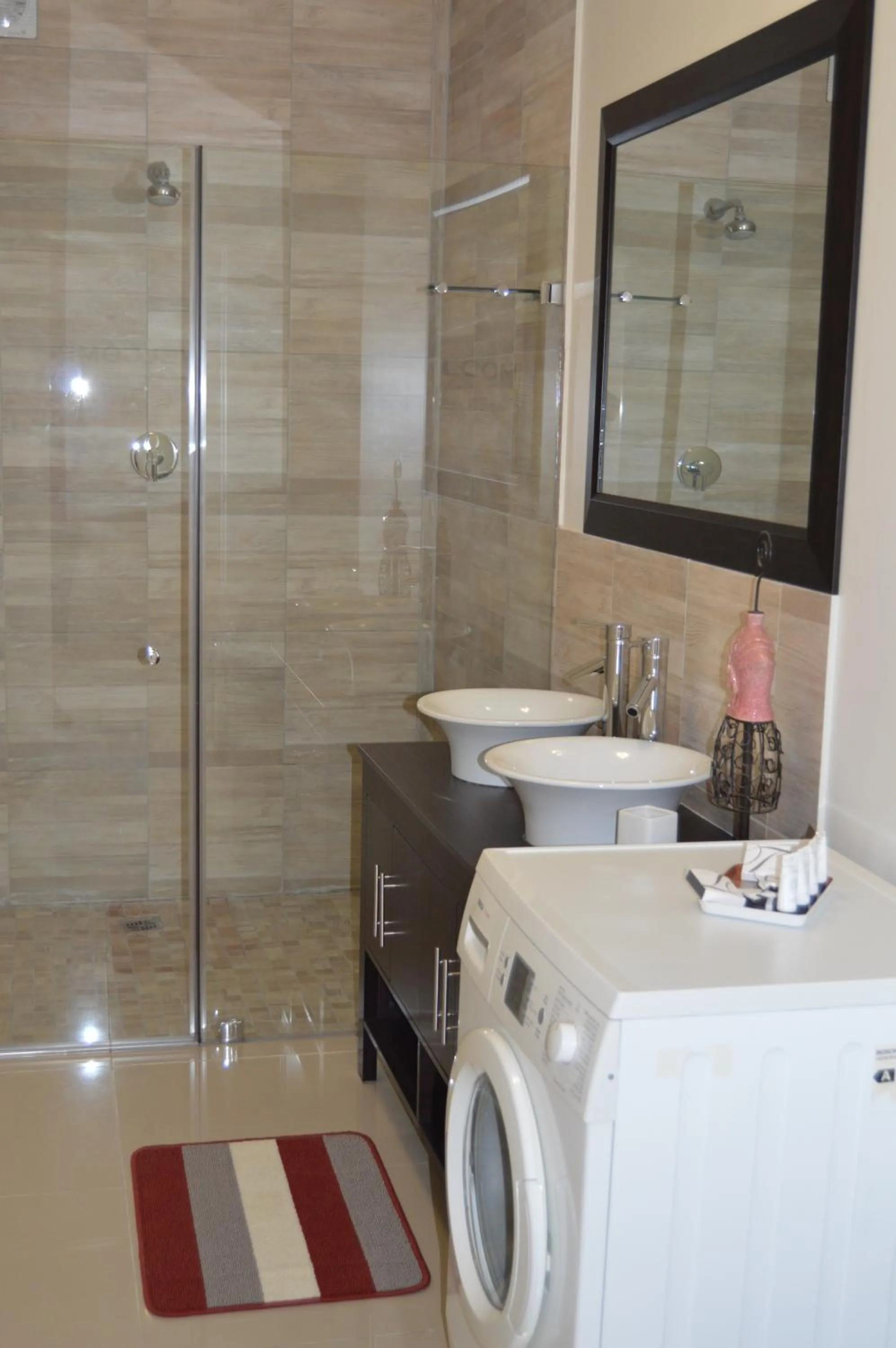 Bathroom in African Palm Cottage and Guesthouse