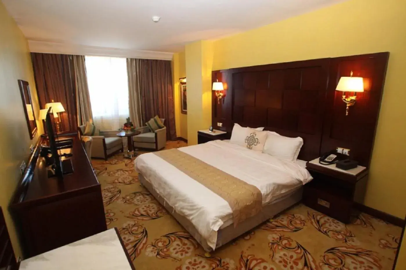 Bed in Oasis Hotel Bed in Oasis Hotel