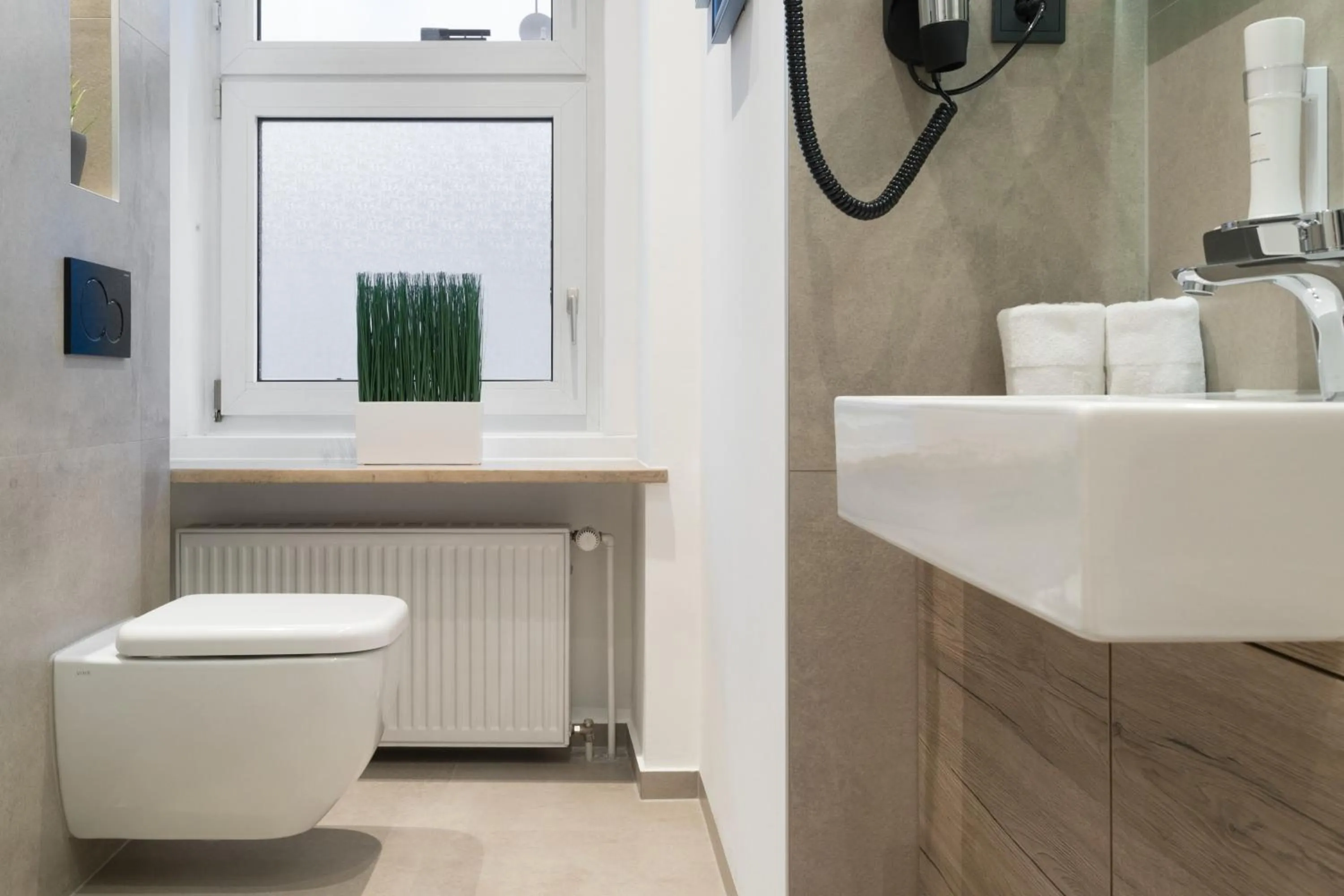 Toilet in Aparthotel by dasPaul