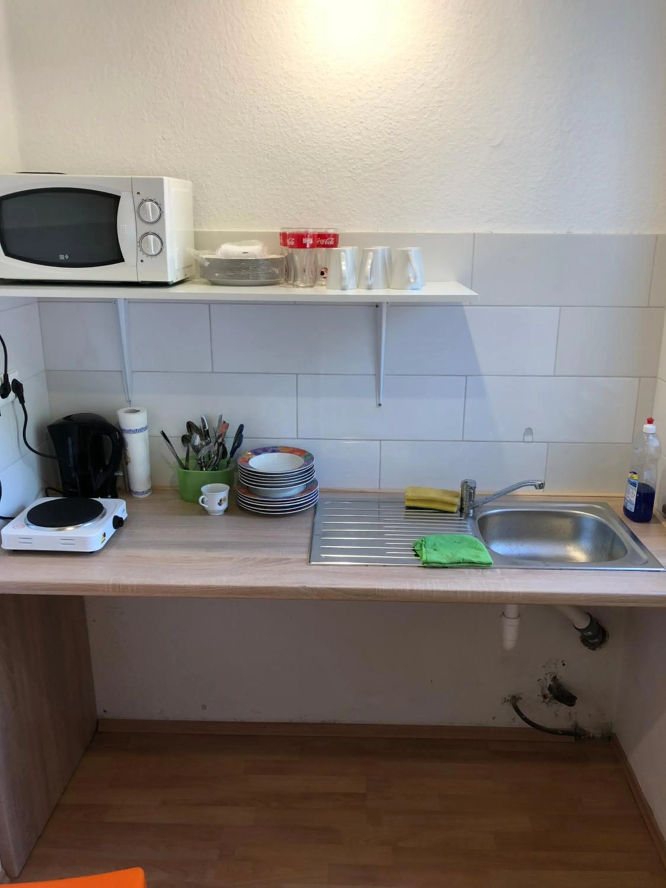 Kitchen or kitchenette in Rana's Zimmervermittlung 2