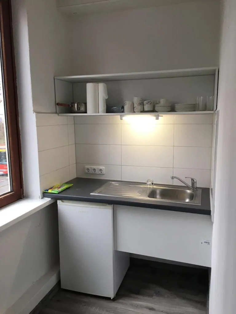 Kitchen or kitchenette in Rana's Zimmervermittlung 2