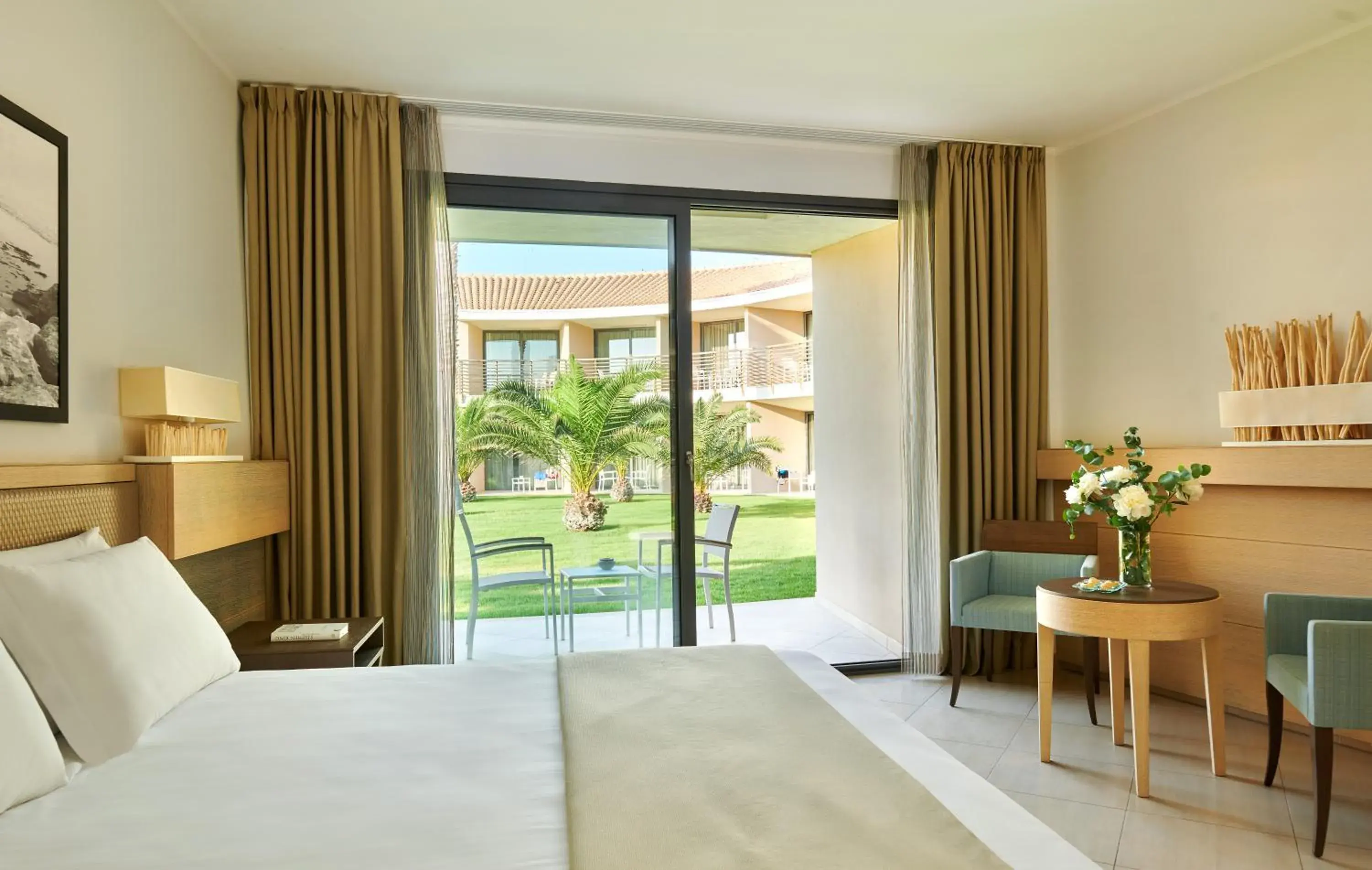 Photo of the whole room, Bed in Capovaticano Resort Thalasso Spa Photo of the whole room, Bed in Capovaticano Resort Thalasso Spa