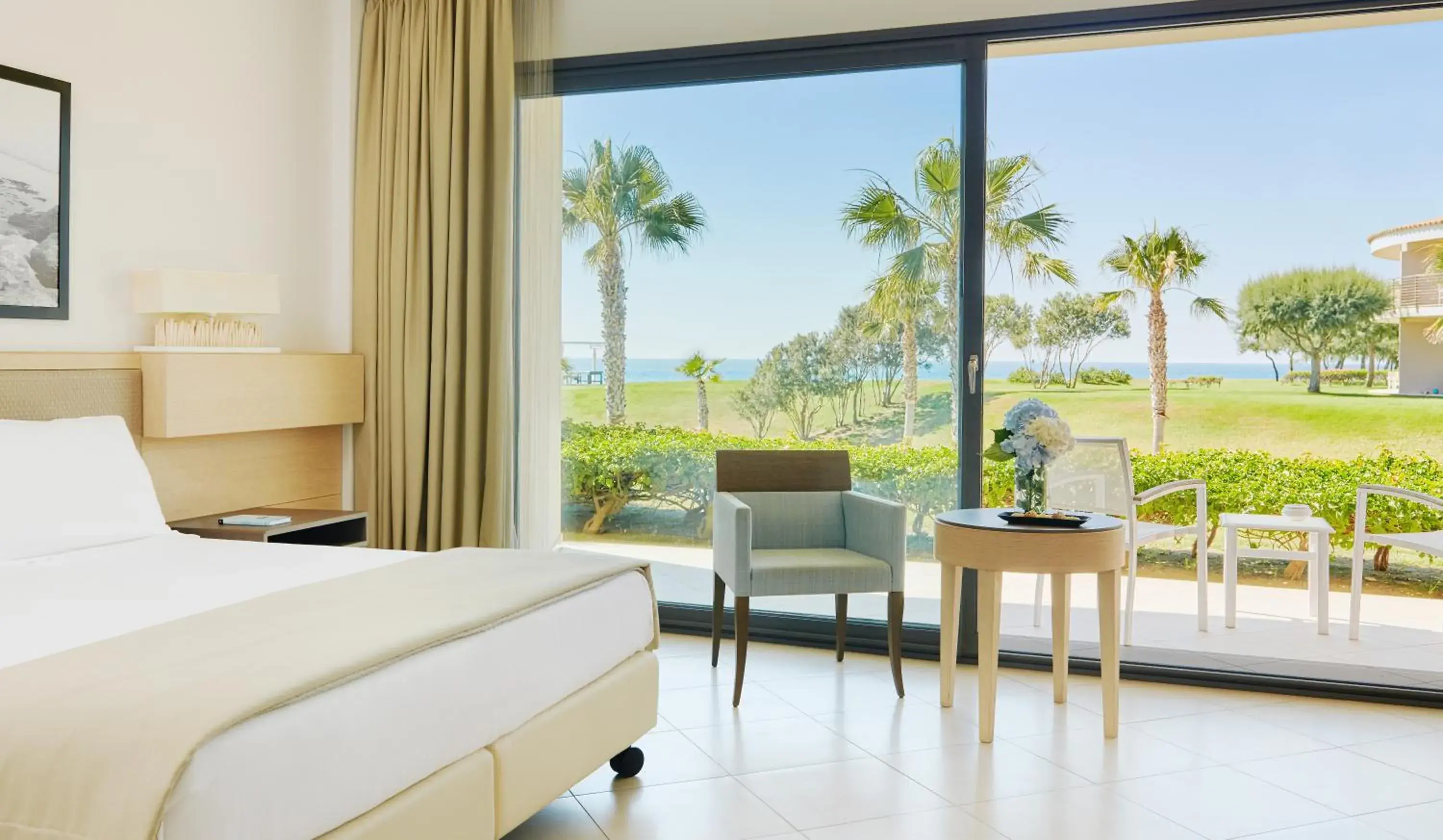 Garden view, Bed in Capovaticano Resort Thalasso Spa Garden view, Bed in Capovaticano Resort Thalasso Spa