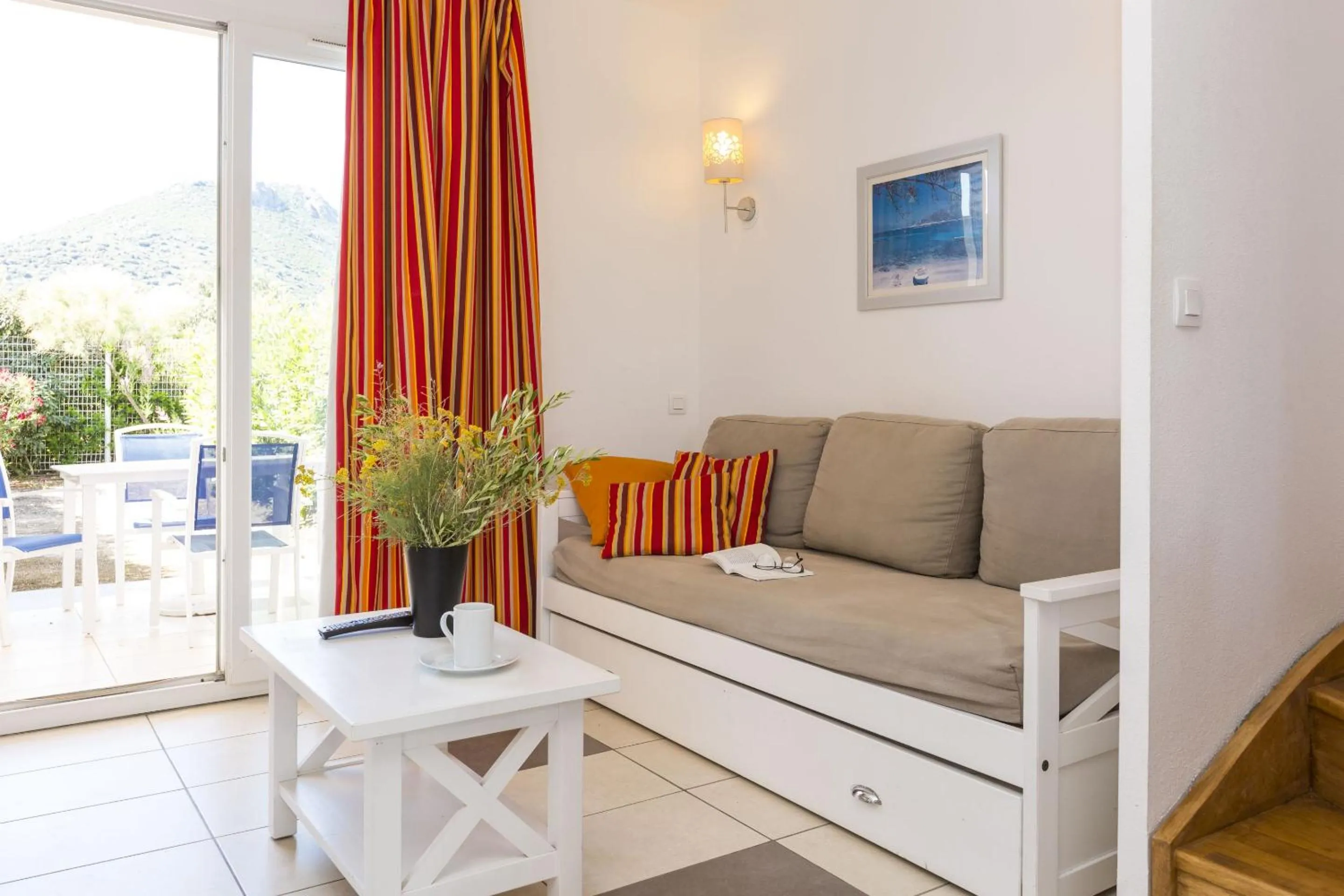 Seating area in Résidence Odalys Les Villas de Bel Godère