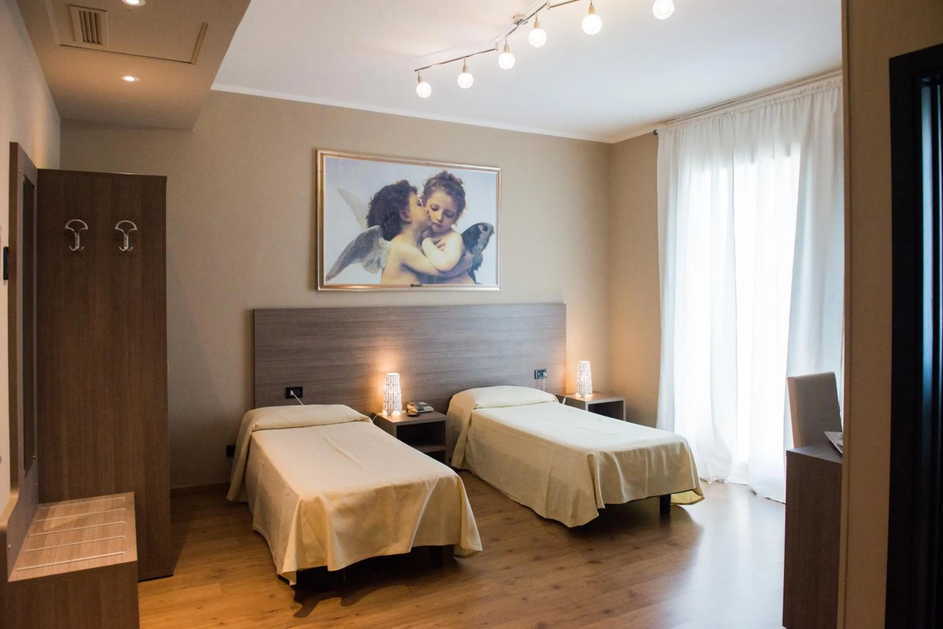 Photo of the whole room, Bed in Albergo Grappolo D'oro