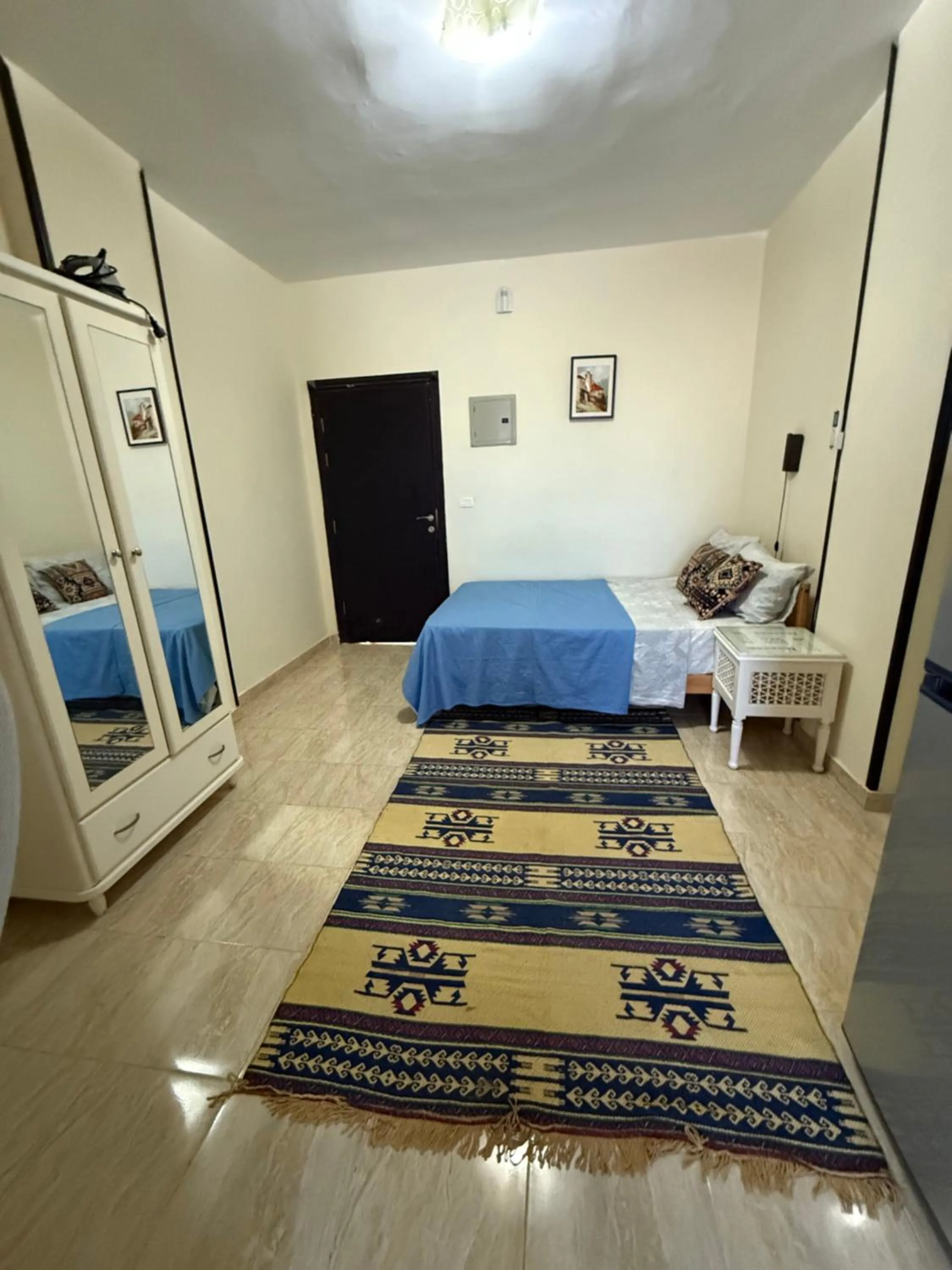 Bed in Cozy little studio near Kite station.