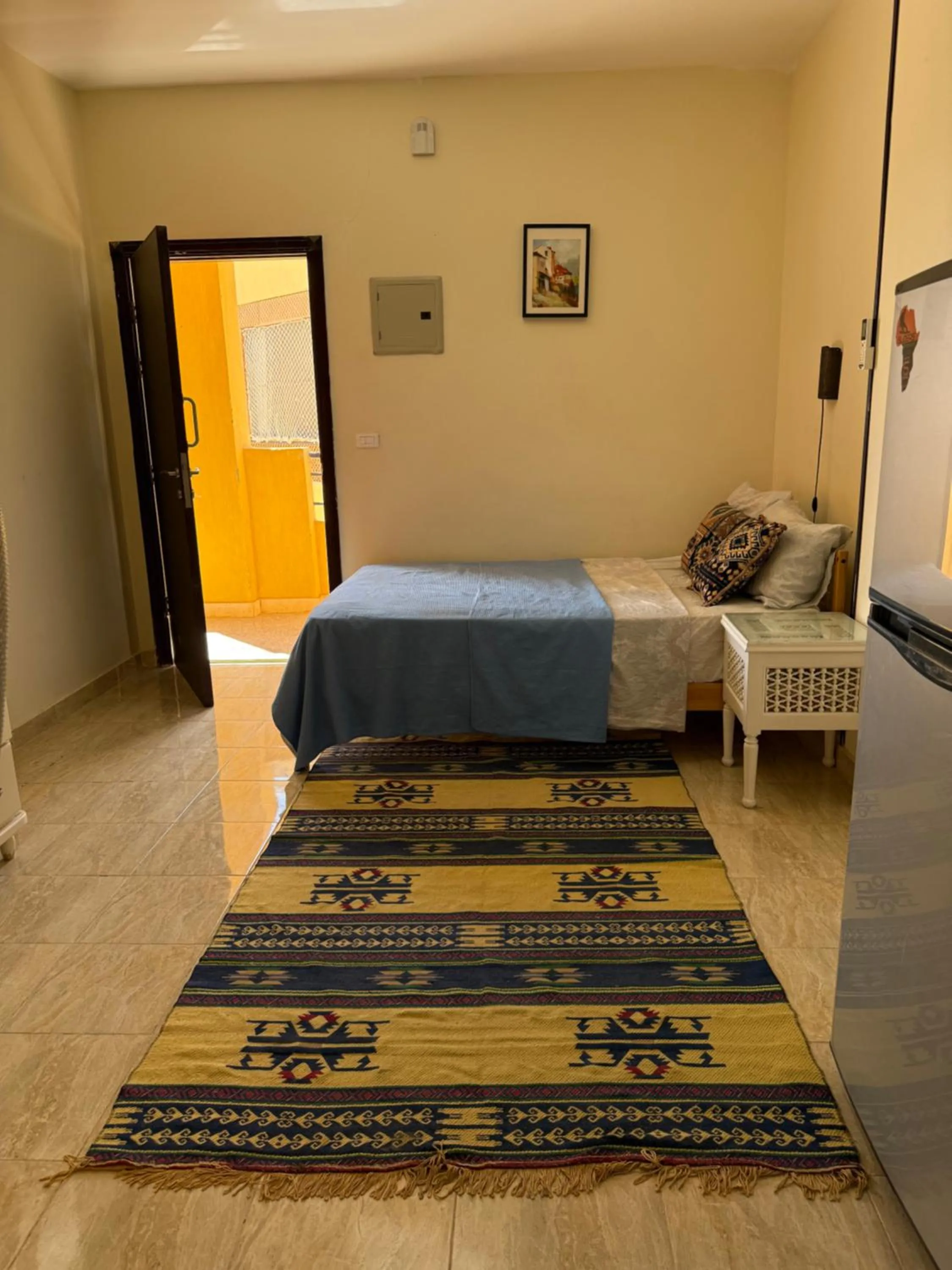 Bed in Cozy little studio near Kite station.
