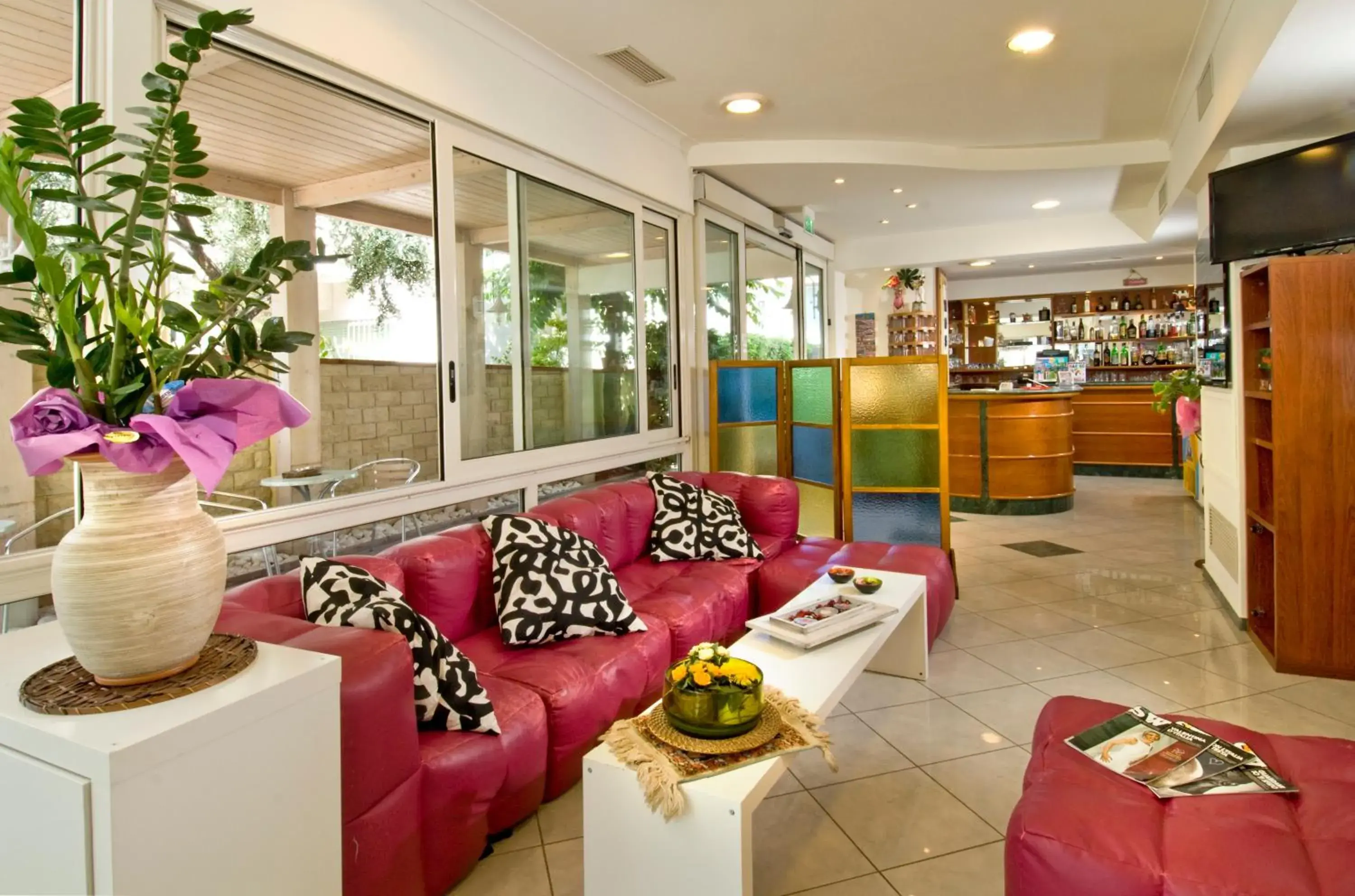 Communal lounge/ TV room, Lobby/Reception in Hotel Locanda Rosy