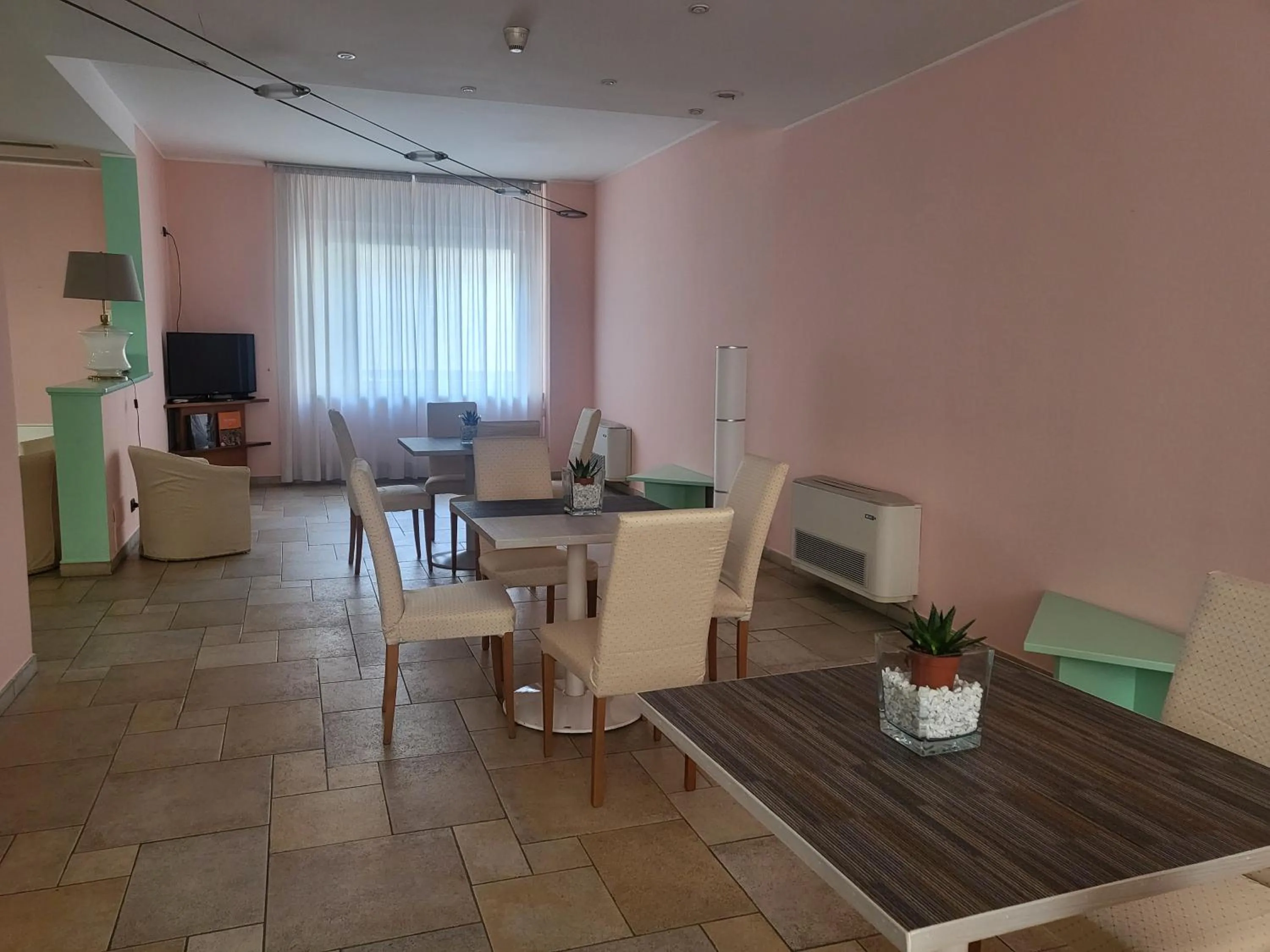 Communal lounge/ TV room in Hotel Lux