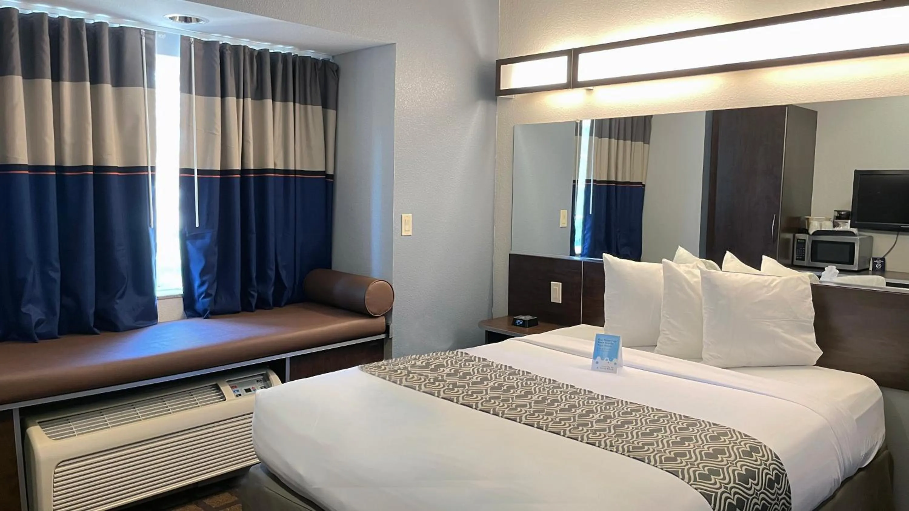 Bed in Microtel Inn & Suites by Wyndham Michigan City