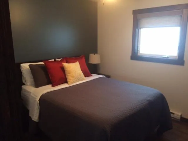 Bed in Bambury's Hillside Chalets