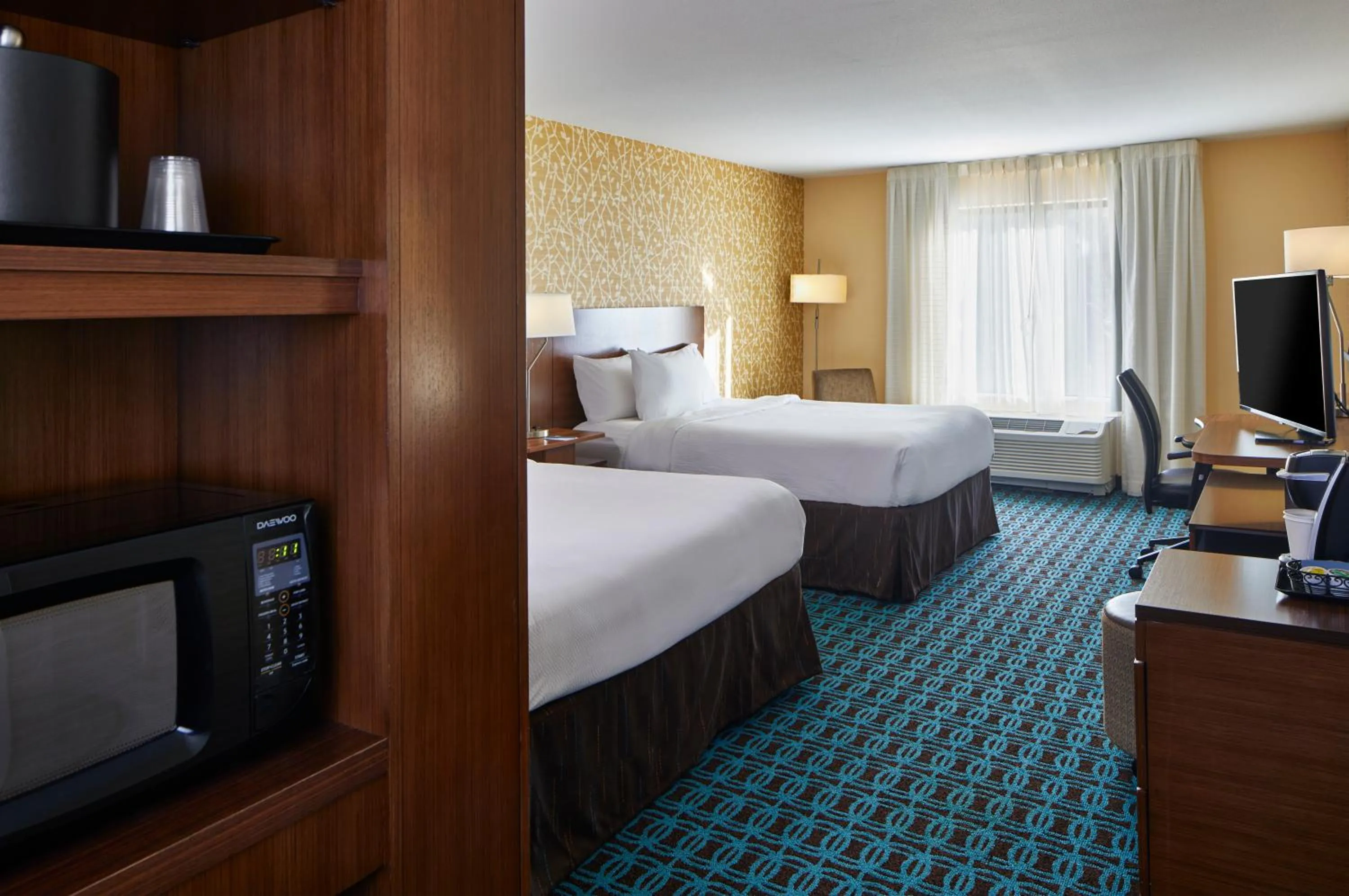 Bed in Fairfield Inn & Suites by Marriott Atlanta Lithia Springs