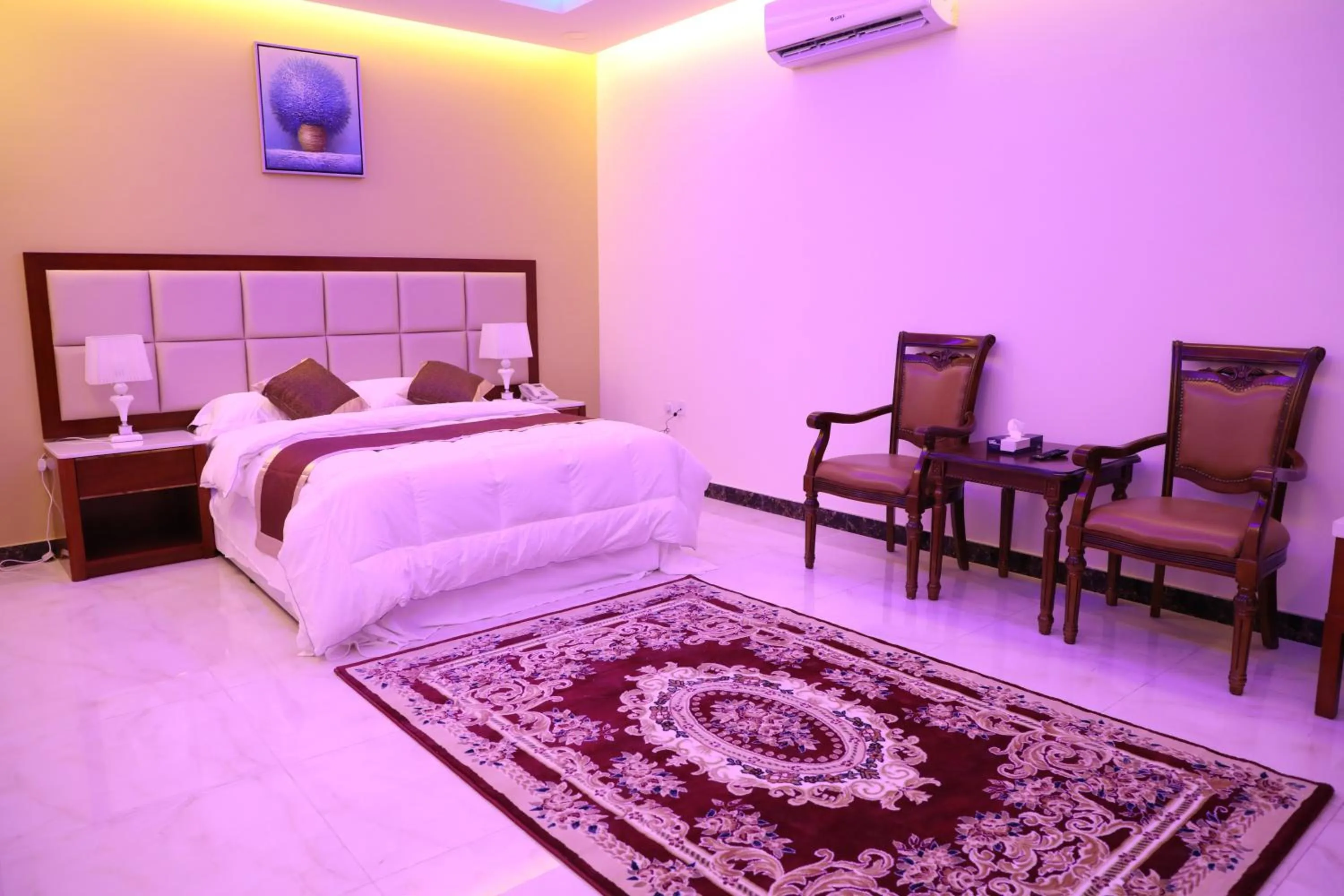 Bed in Ashbilia Suites