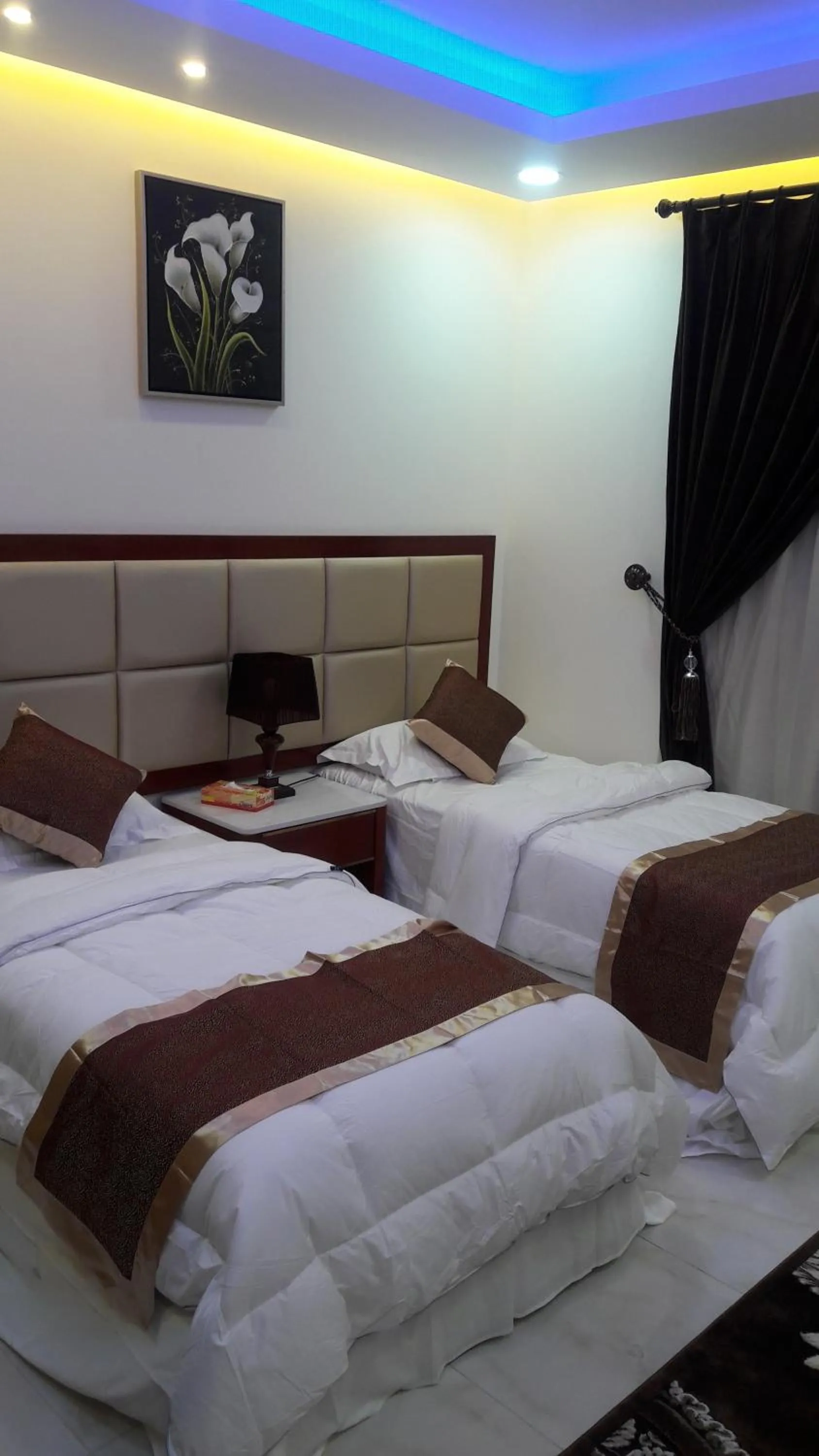 Bed in Ashbilia Suites