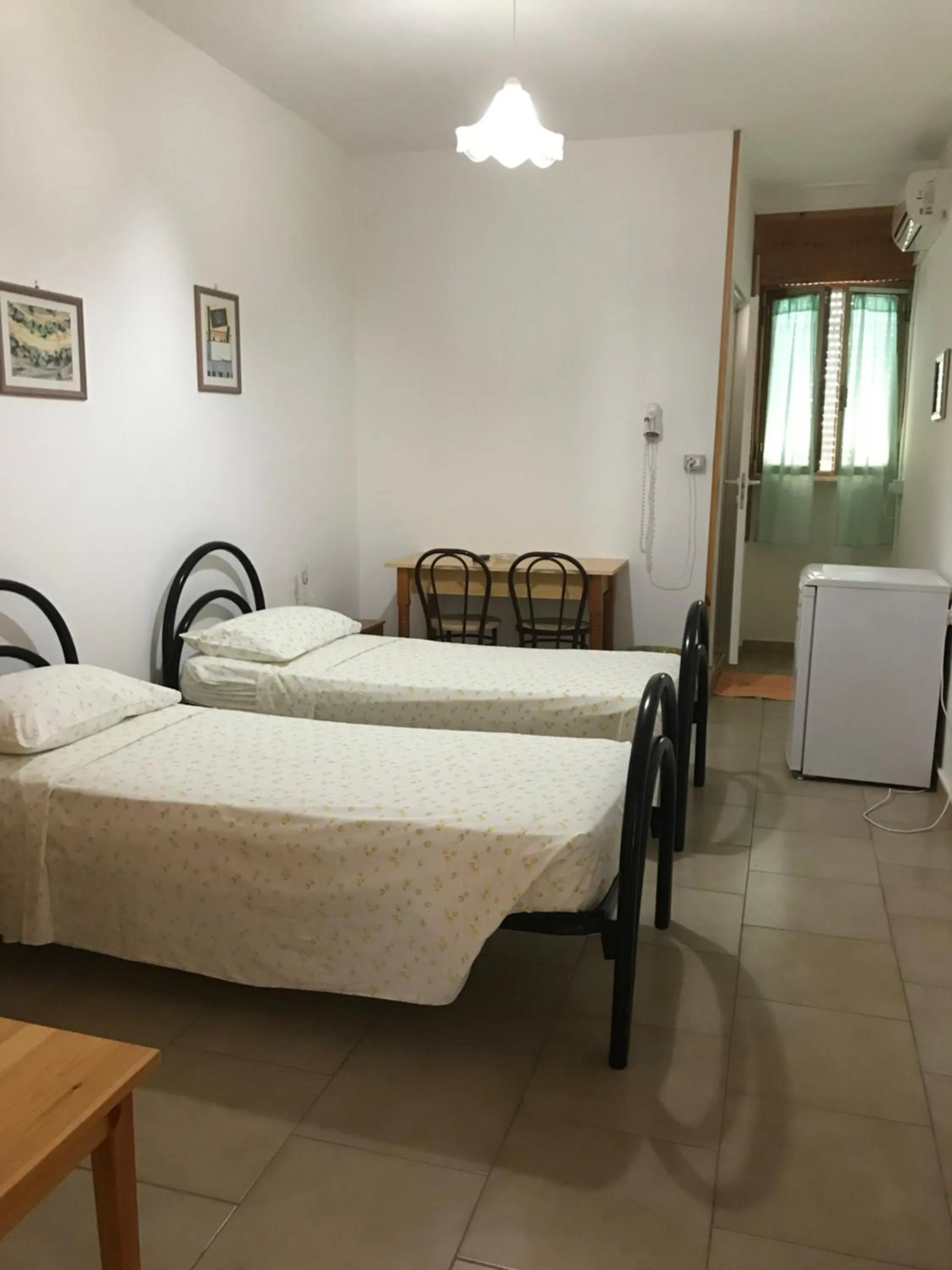 Photo of the whole room, Bed in Albergo Europa