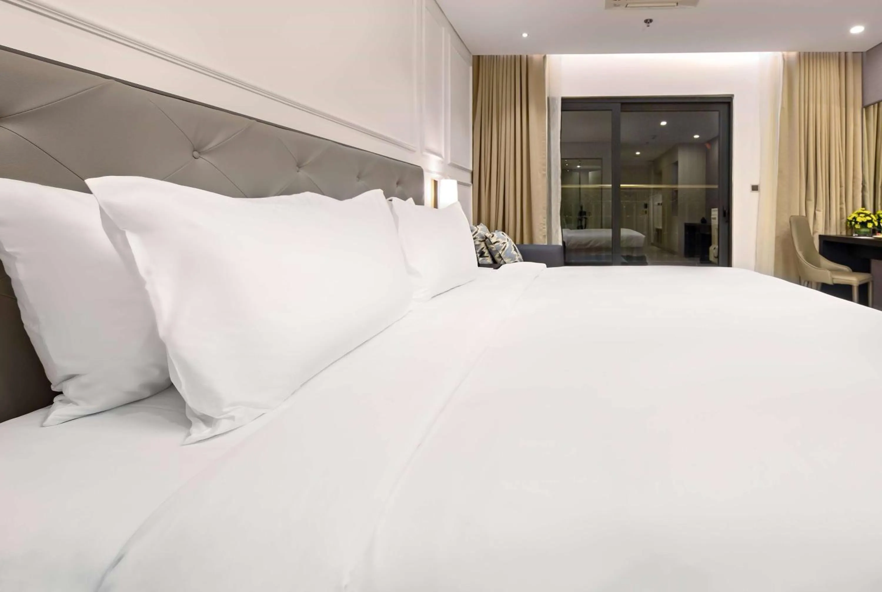 Photo of the whole room, Bed in Wyndham Danang Golden Bay - Free Shuttle Bus to Beach