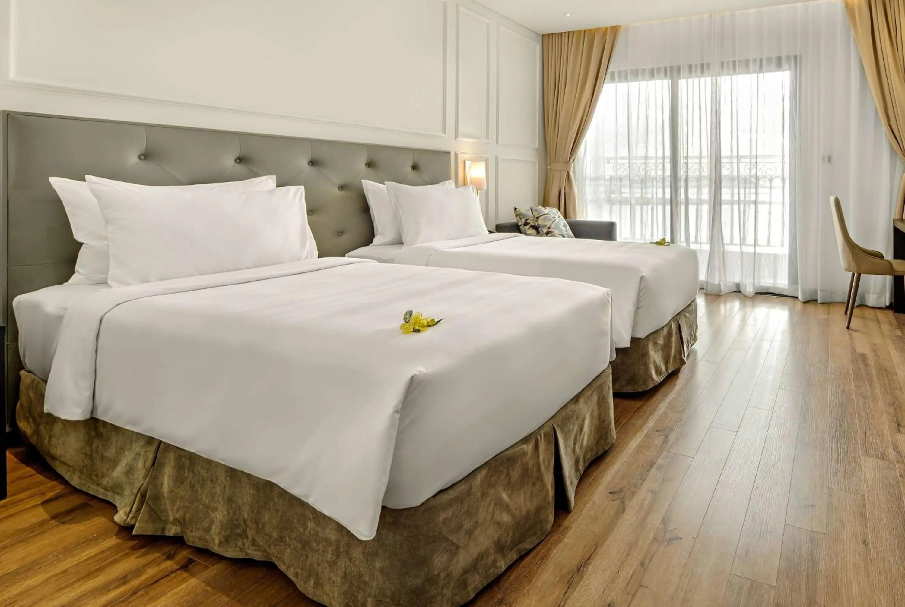 Photo of the whole room, Bed in Wyndham Danang Golden Bay - Free Shuttle Bus to Beach