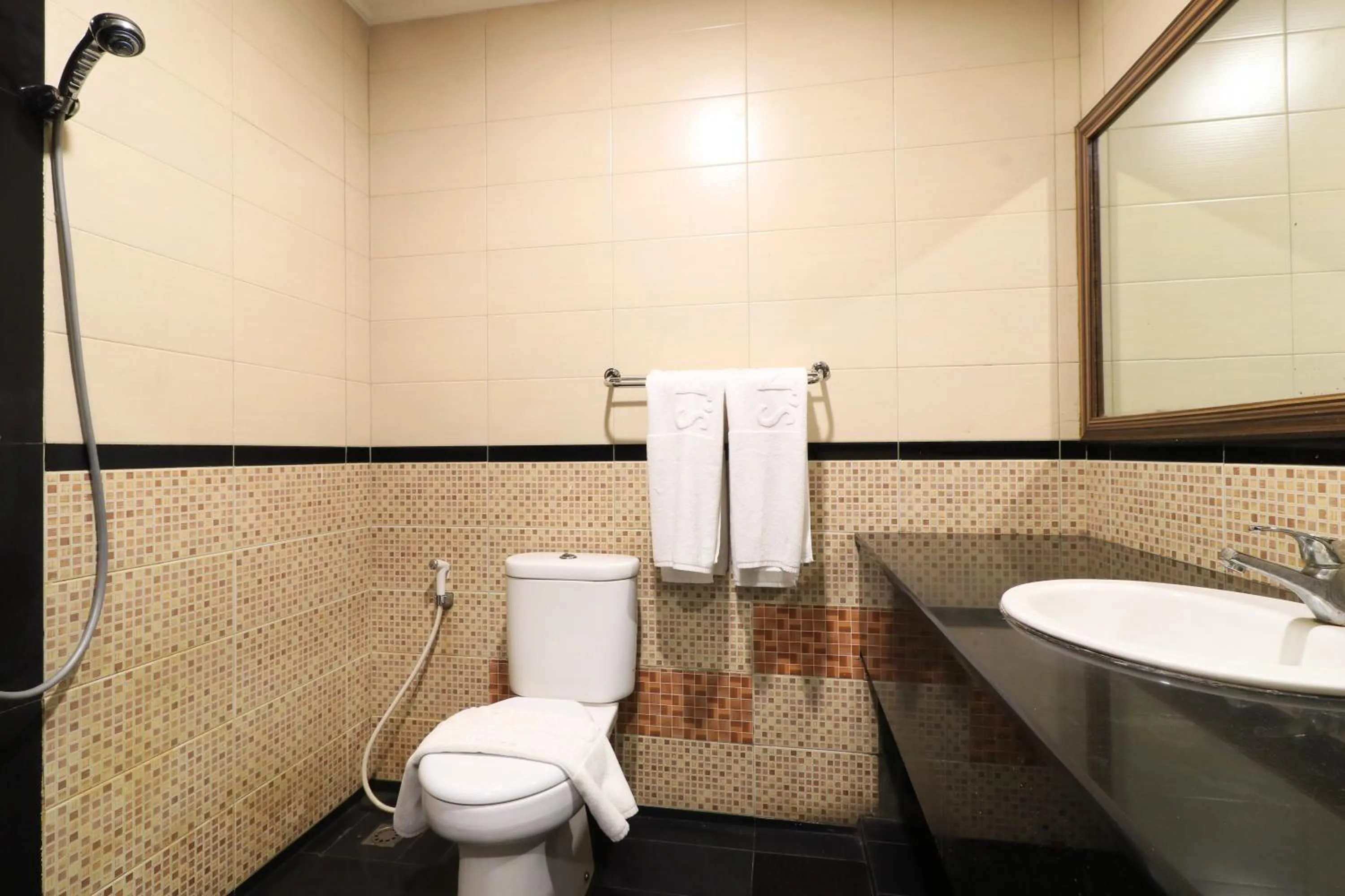 Bathroom in Coins Hotel Jakarta