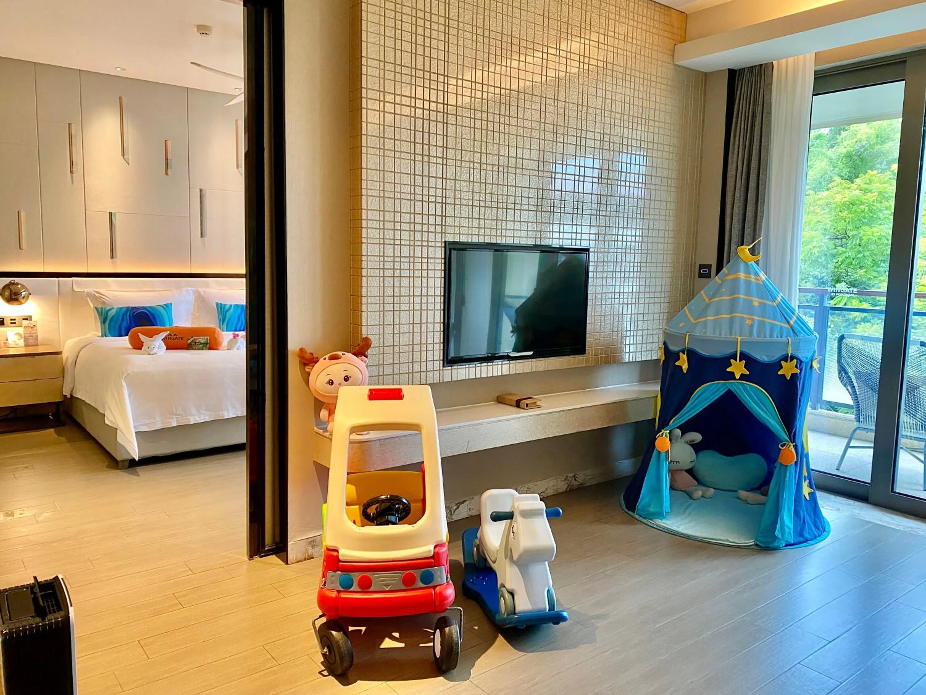 Living room, Bed in 三亚鹿回头蔚景温德姆酒店