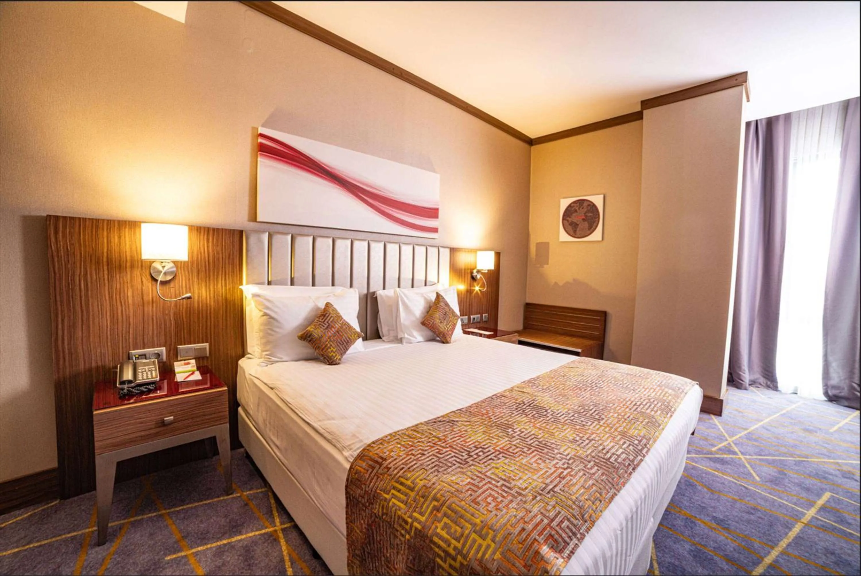 Photo of the whole room, Bed in Ramada by Wyndham Istanbul Alibeykoy