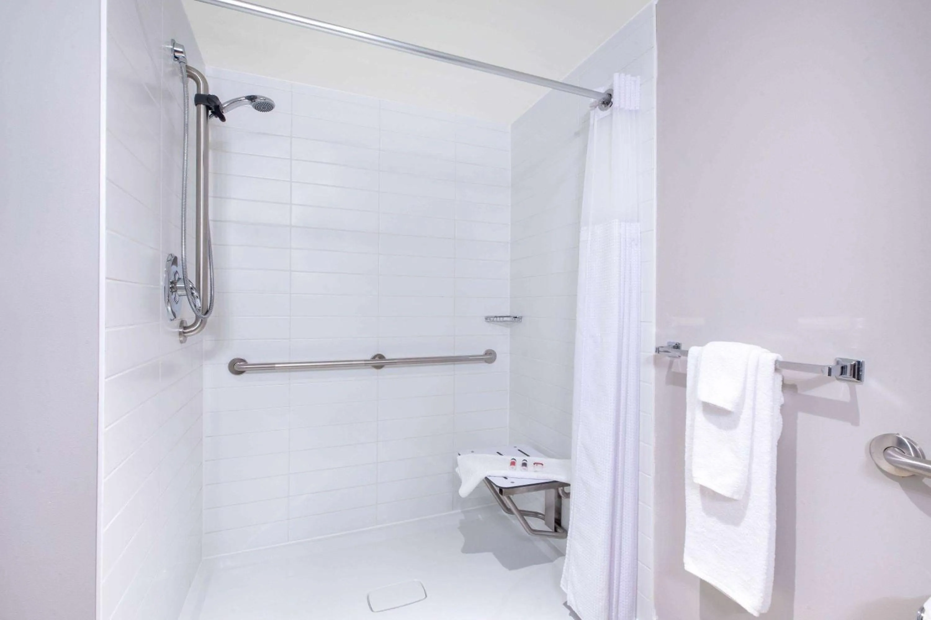 Shower in Microtel Inn & Suites by Wyndham Fort McMurray