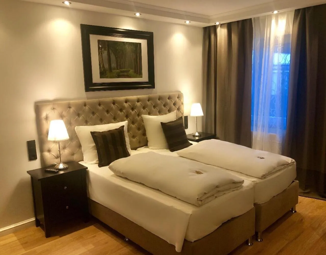 Bed in Hotel Ramor Garni