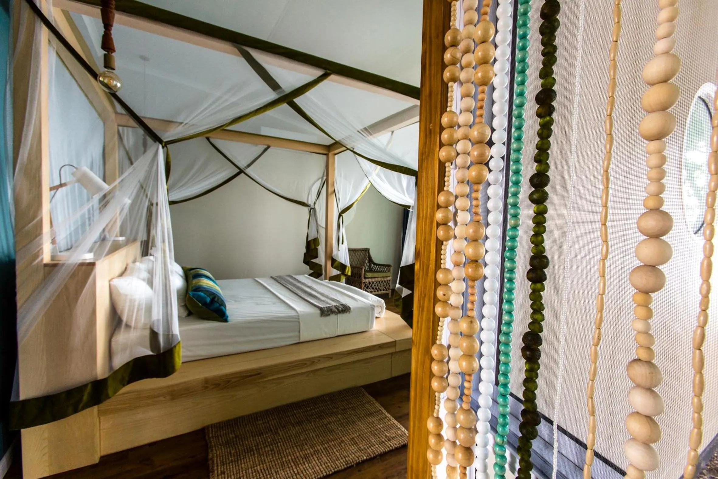 Bed in Zambezi Mubala Lodge