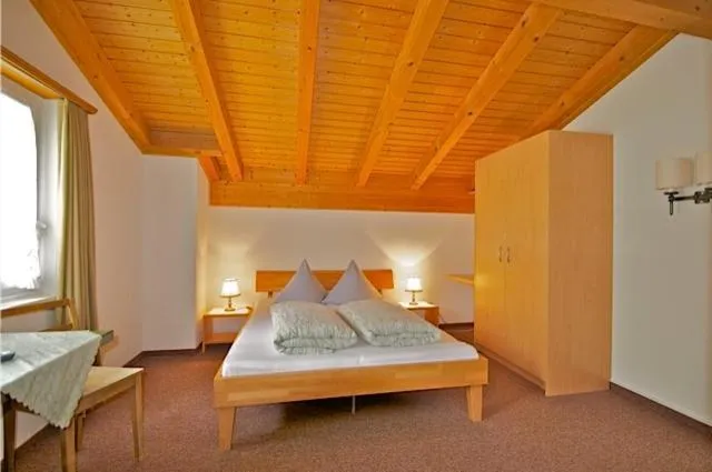 Photo of the whole room, Bed in Gasthaus Skiklub