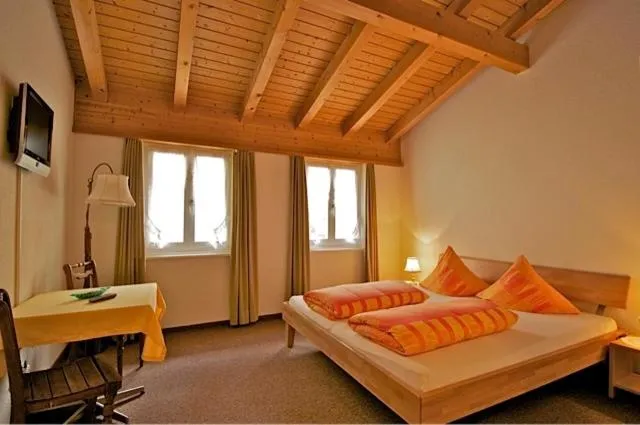 Photo of the whole room, Bed in Gasthaus Skiklub