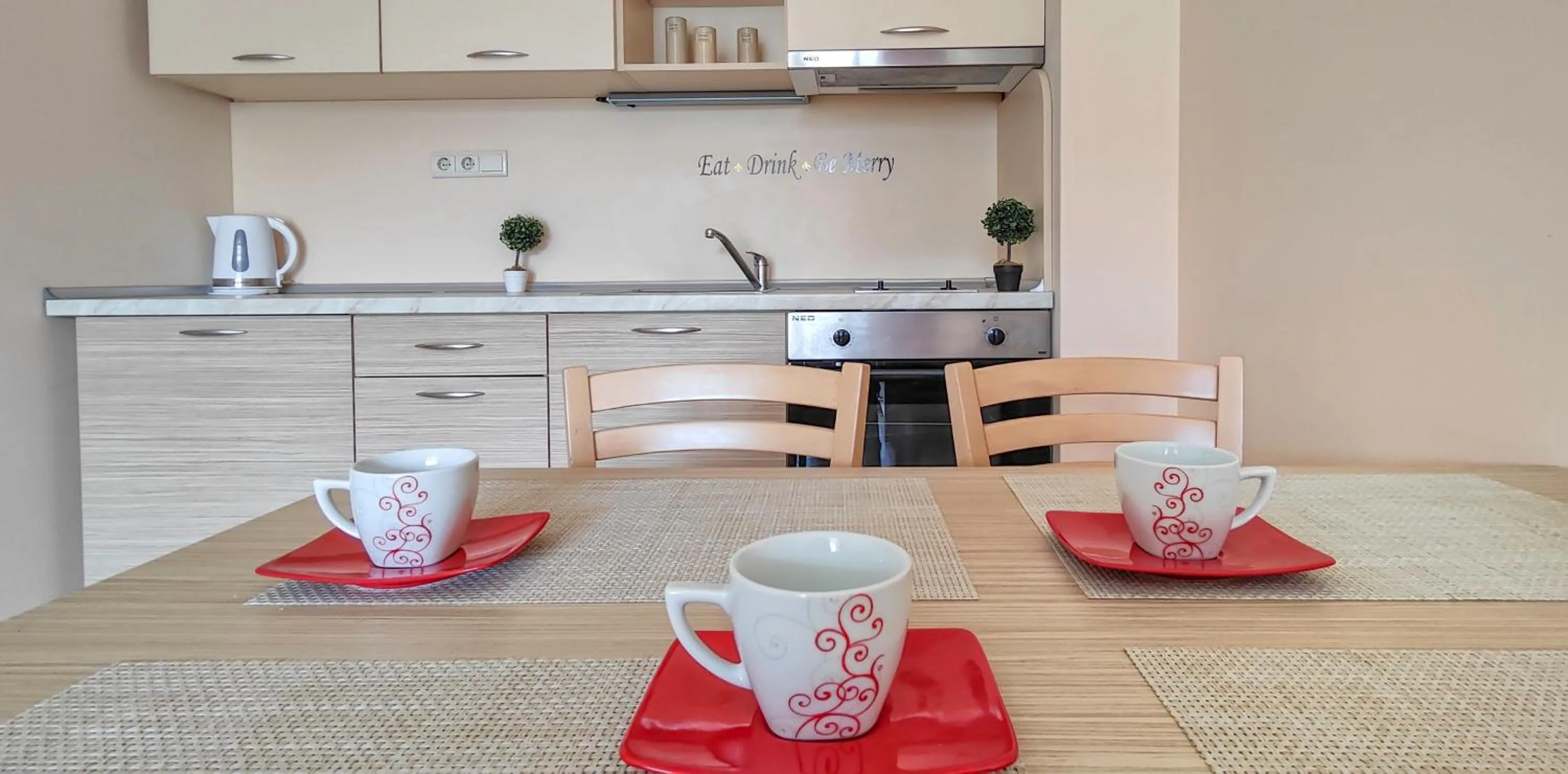 Kitchen or kitchenette in Royal Sun Apartments