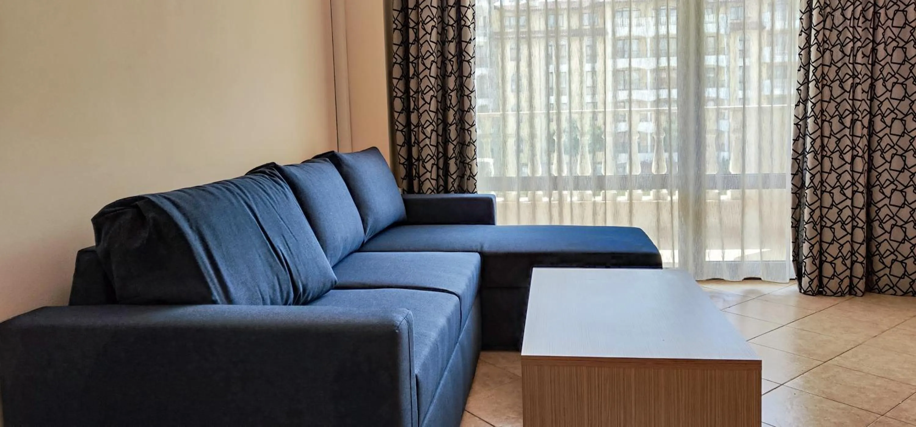 Bed in Royal Sun Apartments