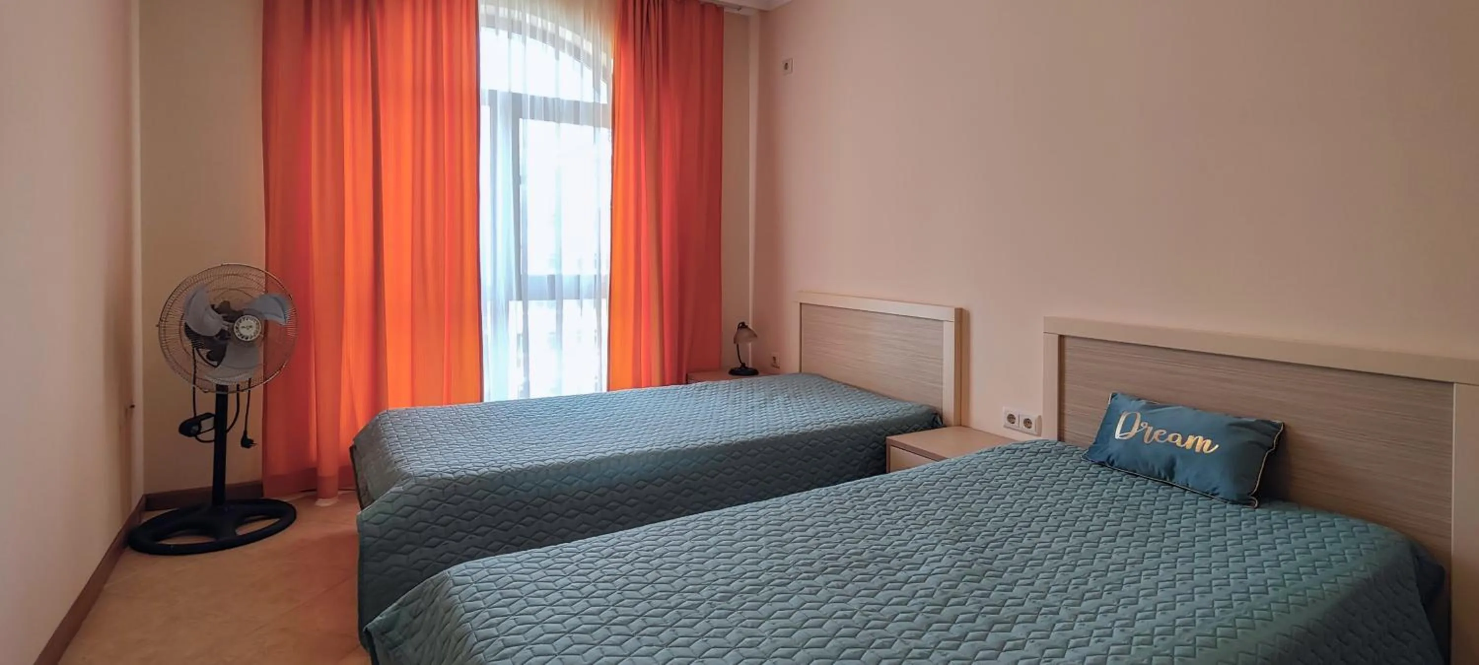 Bed in Royal Sun Apartments