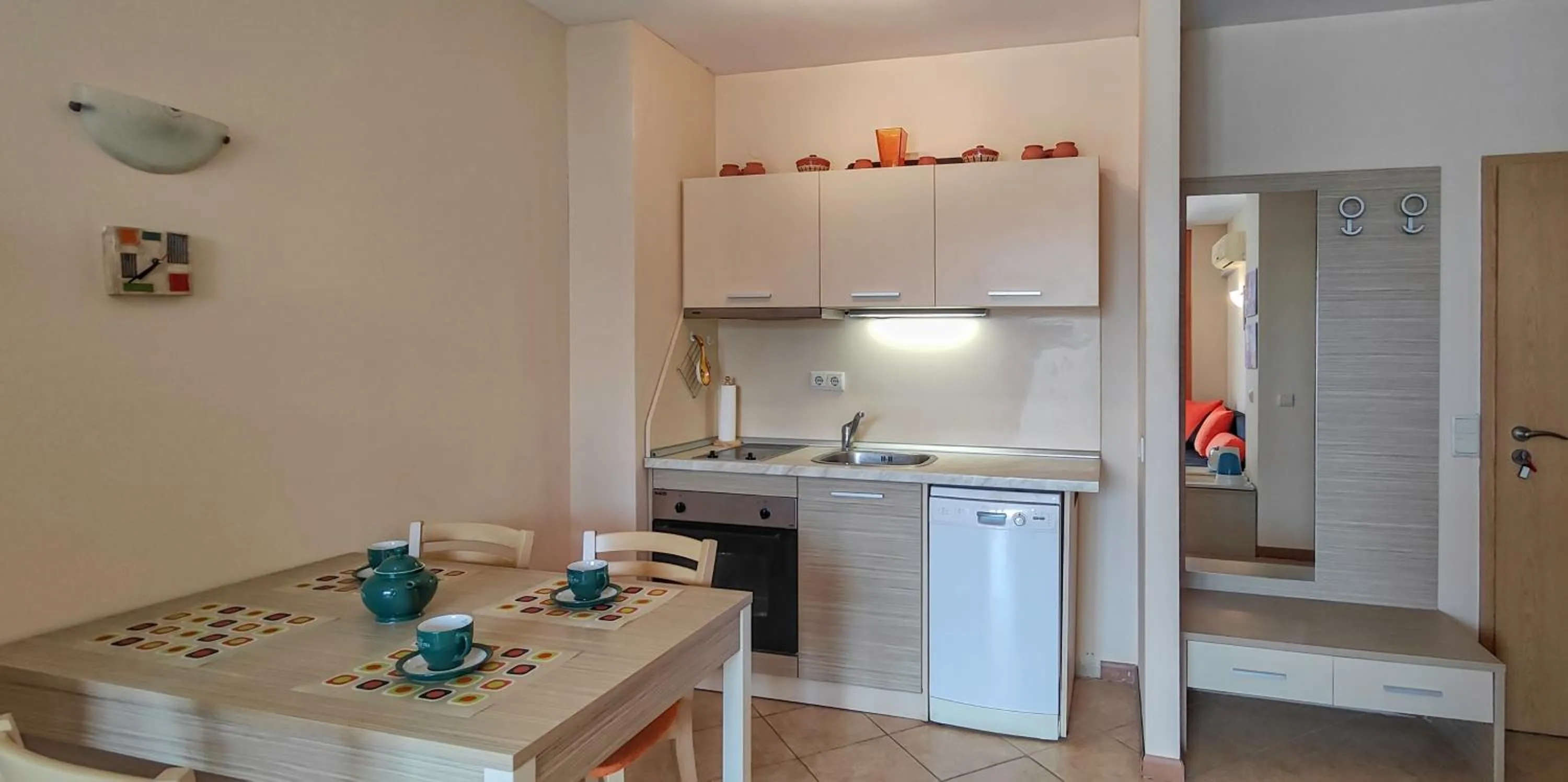 Kitchen or kitchenette in Royal Sun Apartments