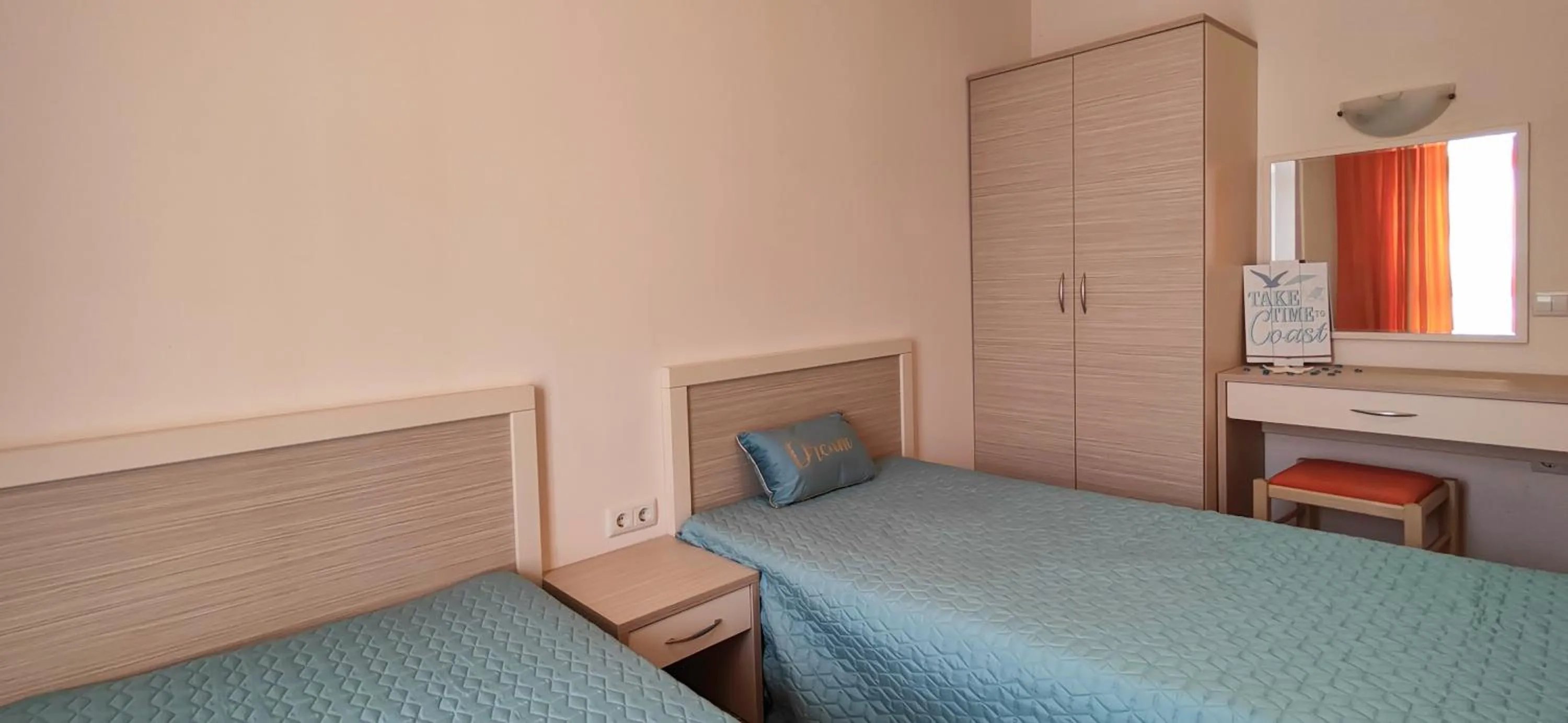 Bed in Royal Sun Apartments