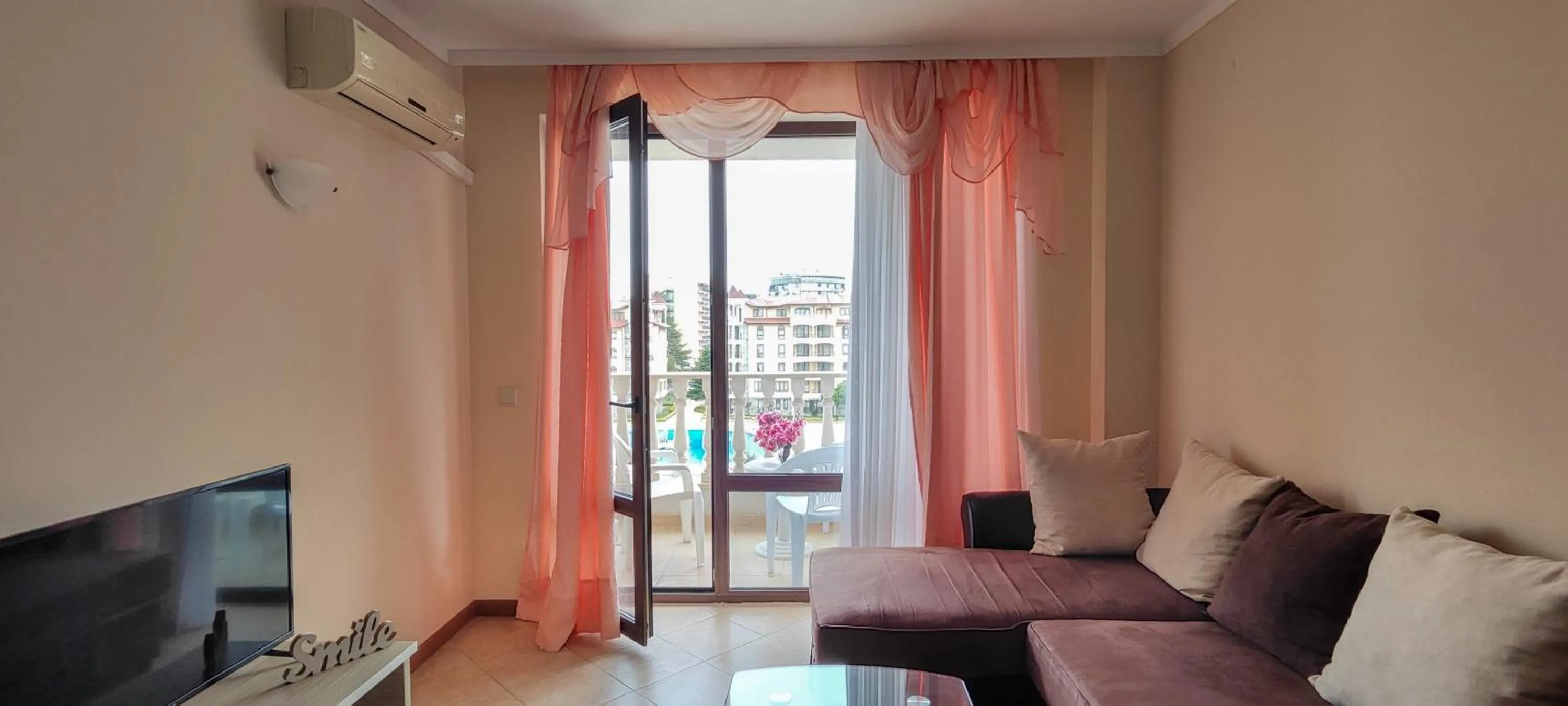 Bed in Royal Sun Apartments