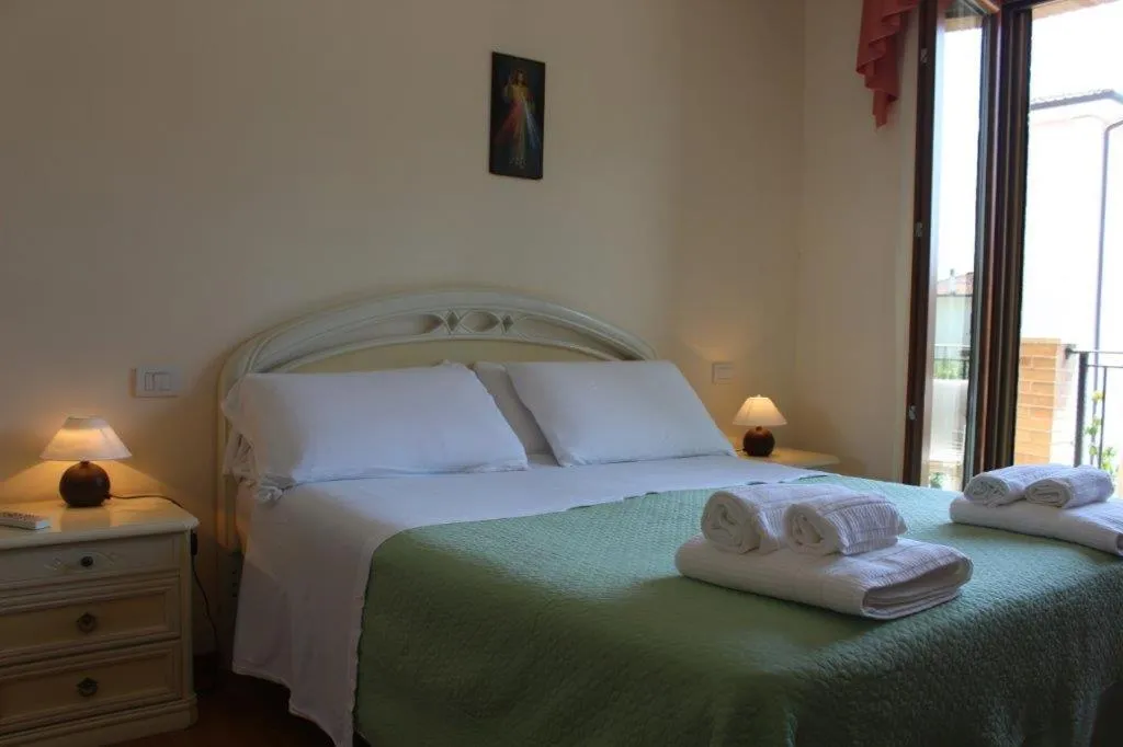 Bed in AFFITTACAMERE La Tartaruga