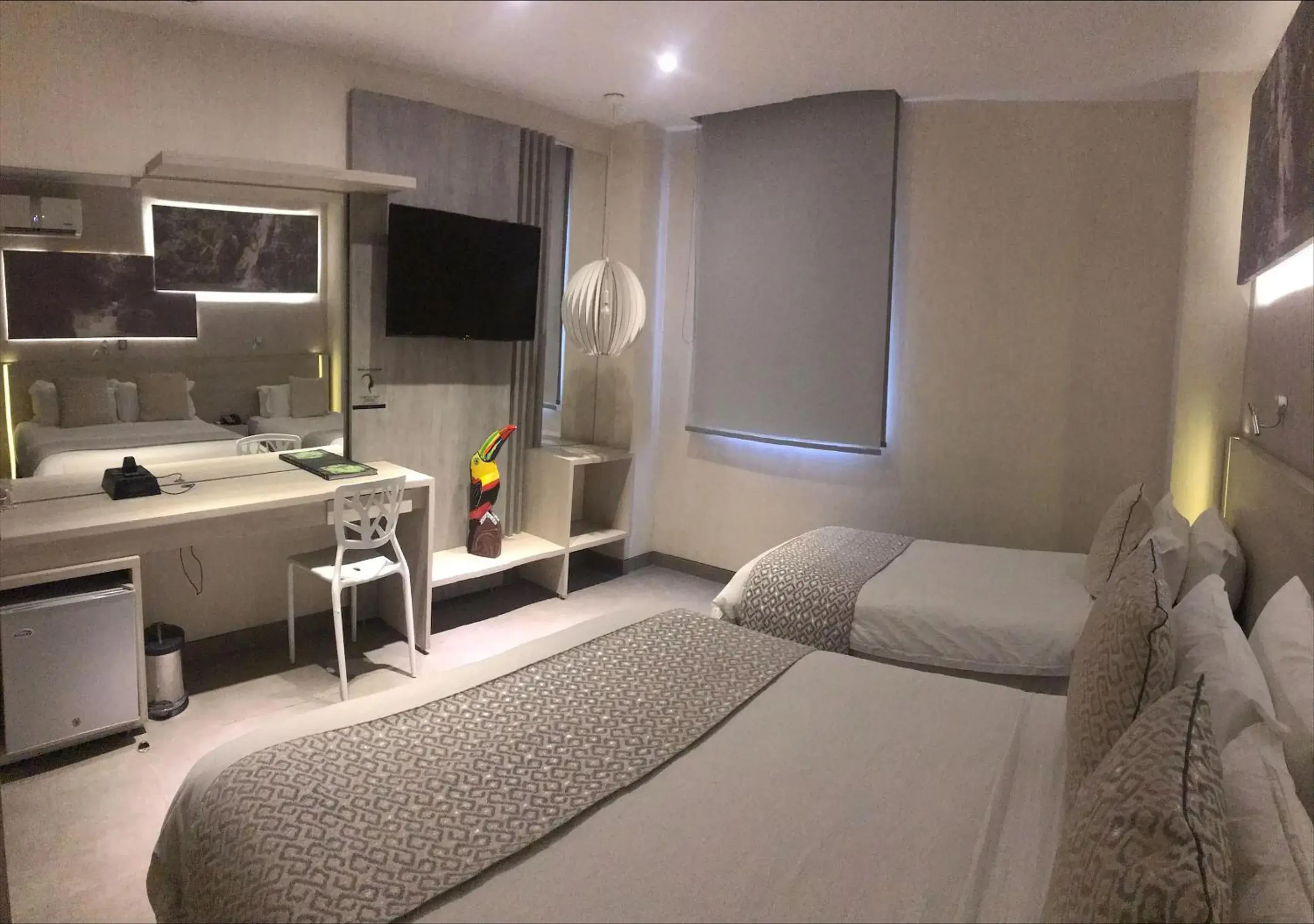 Bedroom, Bed in Hotel Perla Suite Santa Marta Bedroom, Bed in Hotel Perla Suite Santa Marta