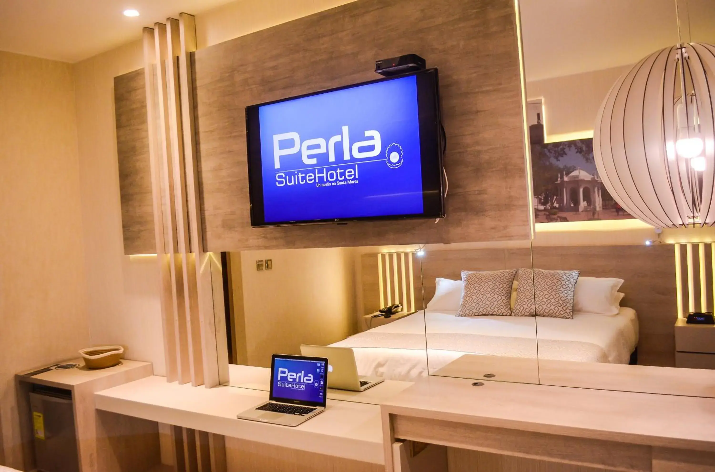 Bedroom, Bed in Hotel Perla Suite Santa Marta Bedroom, Bed in Hotel Perla Suite Santa Marta