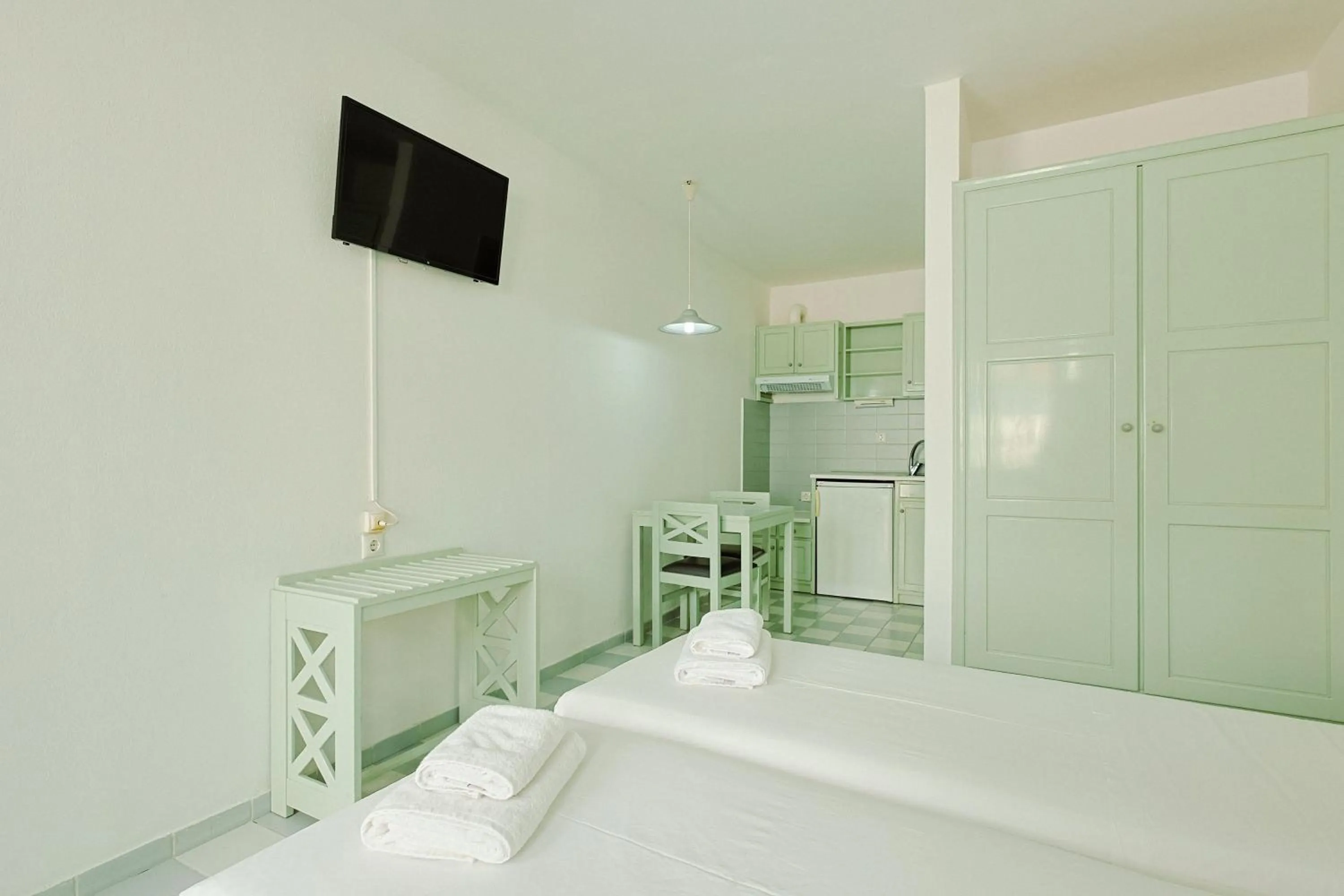 Bed in Porto Greco Village Beach Hotel