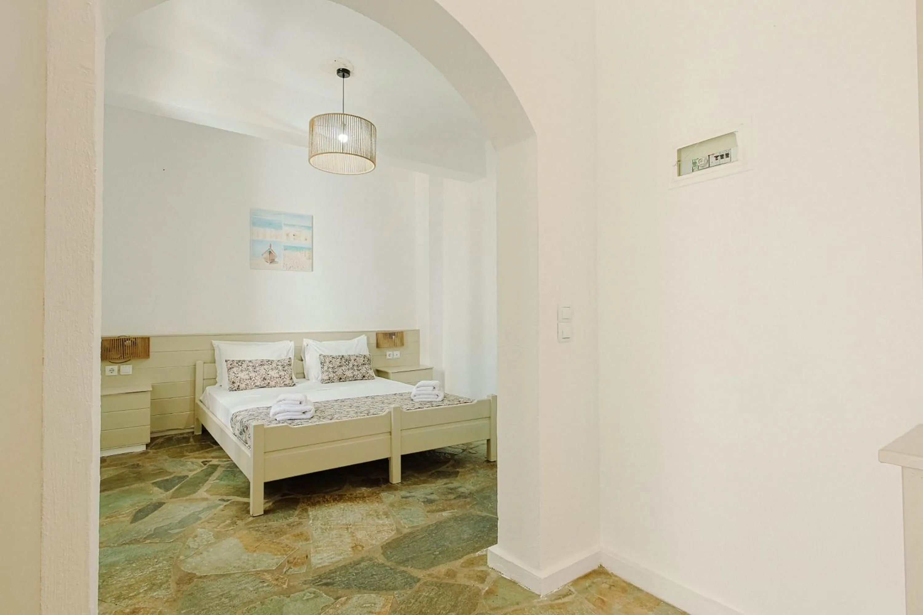 Bed in Porto Greco Village Beach Hotel