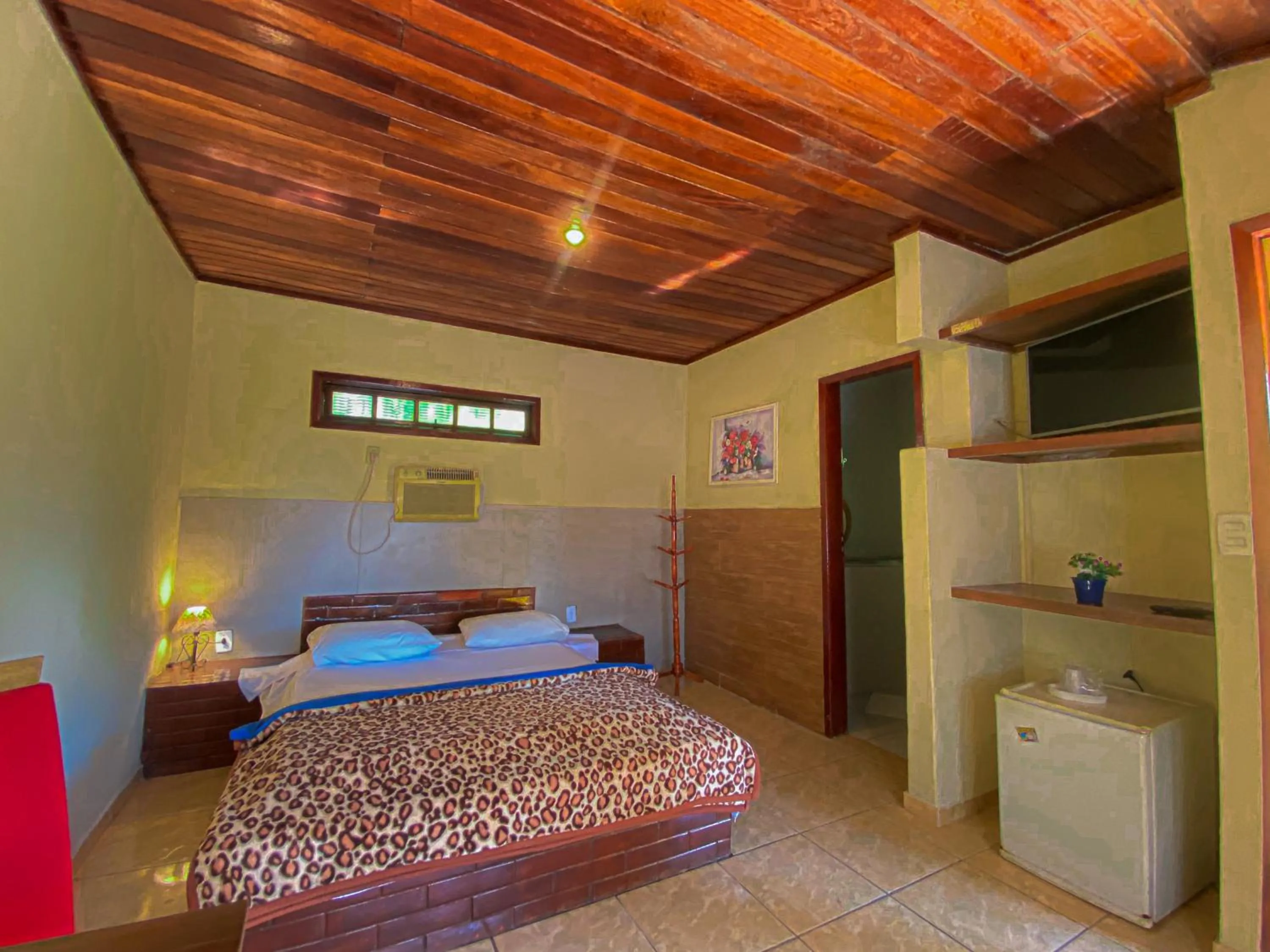 Bed in Pousada Chale da Montanha