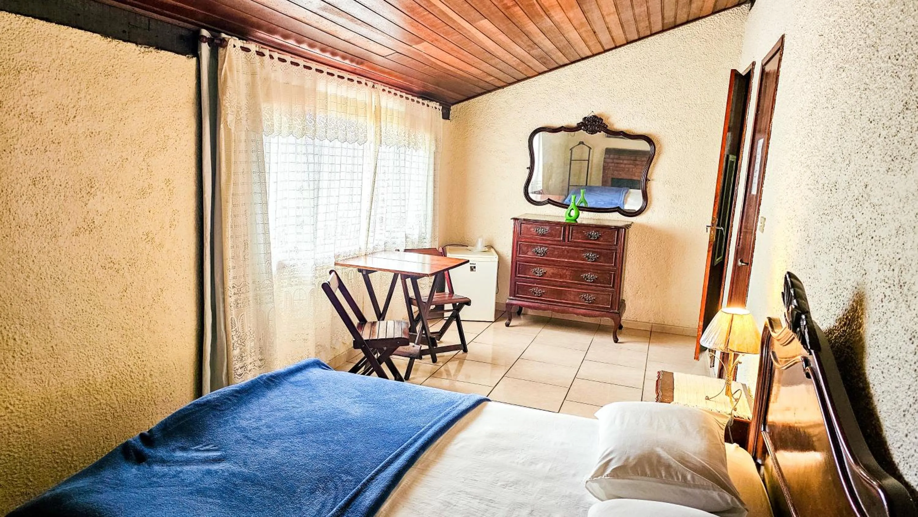 Bed in Pousada Chale da Montanha