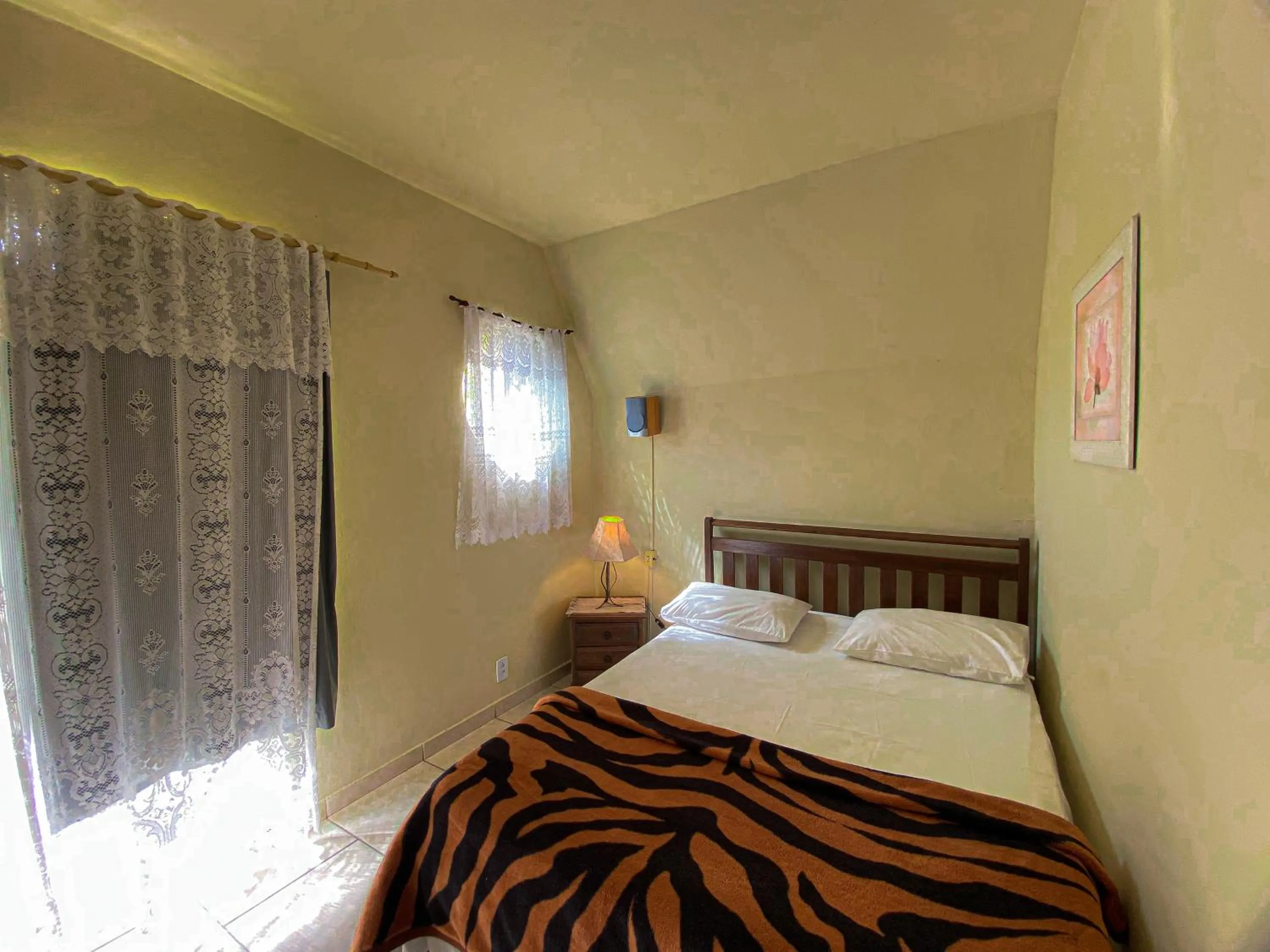 Bed in Pousada Chale da Montanha