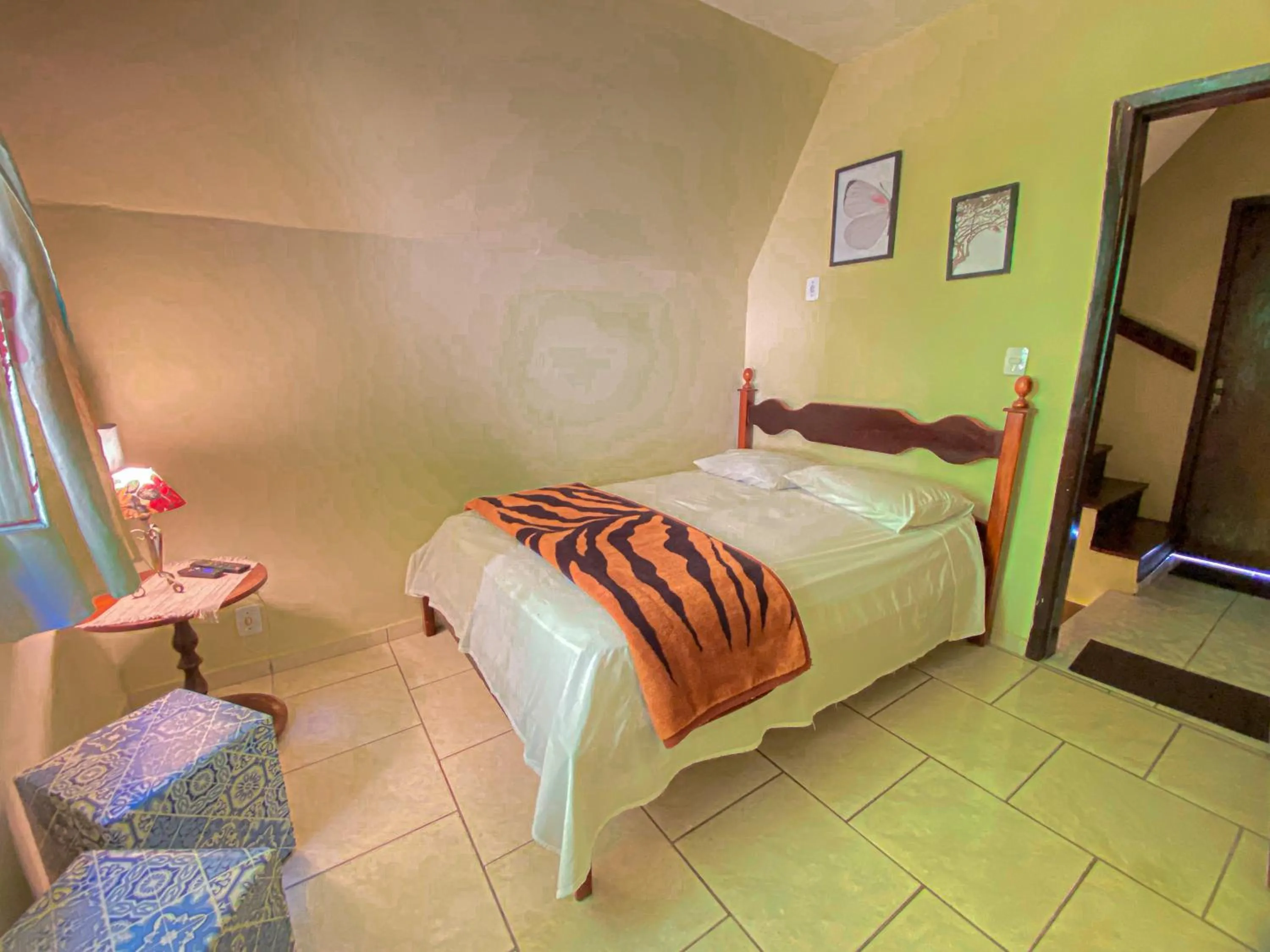 Bed in Pousada Chale da Montanha